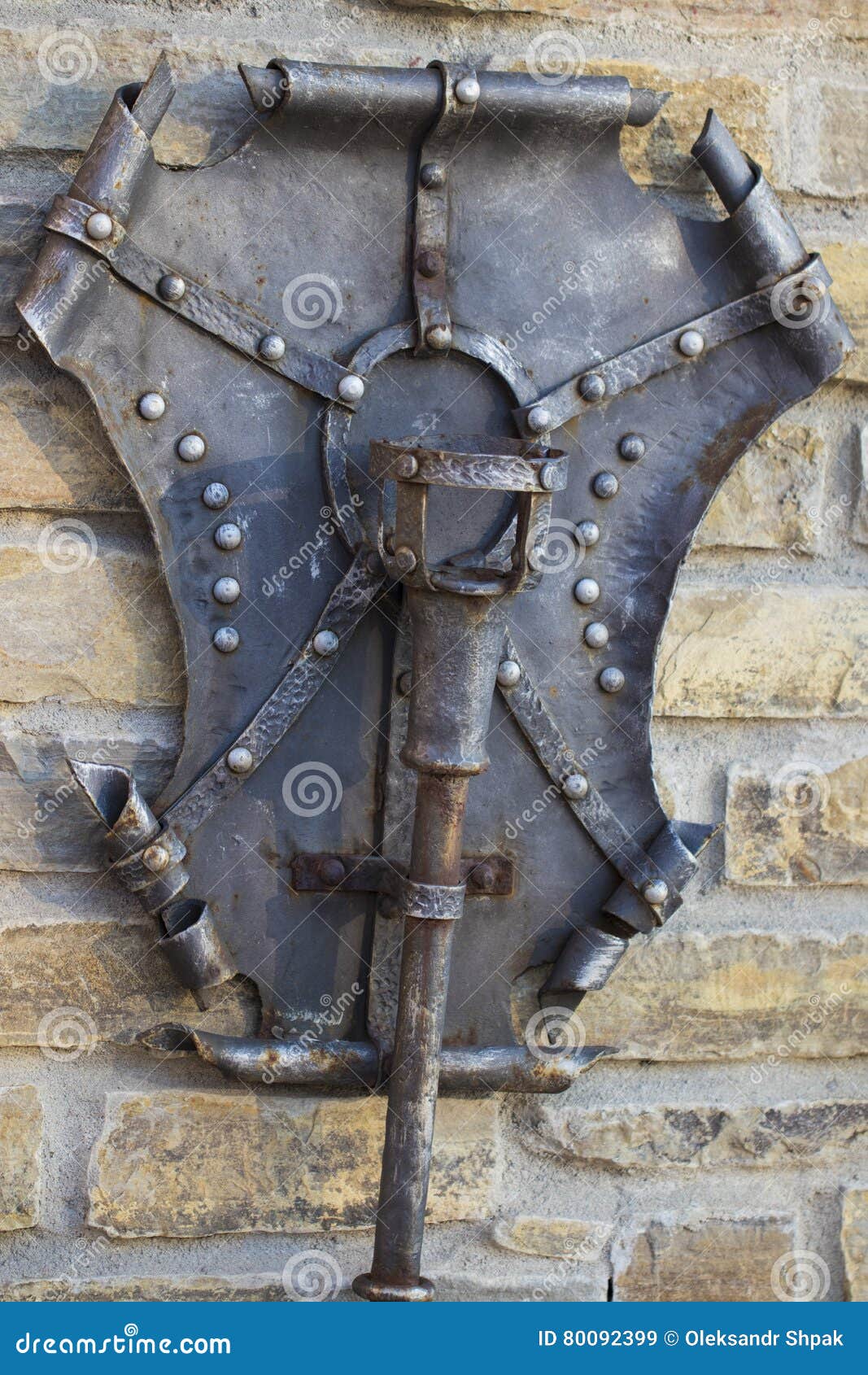 Old Metal Torch with the Shield Stock Image - Image of antique, symbols