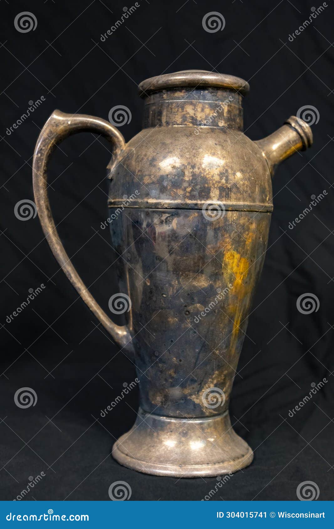 old metal vase, rough patina