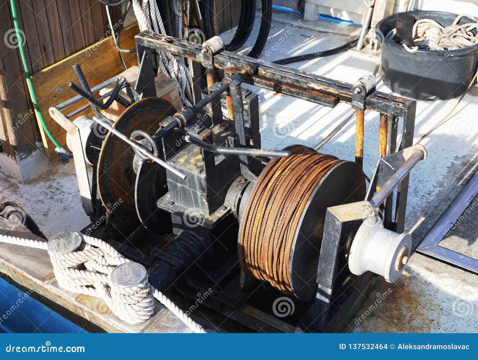 Old Metal Winch and Ropes on the Old Fishing Boat Stock Photo