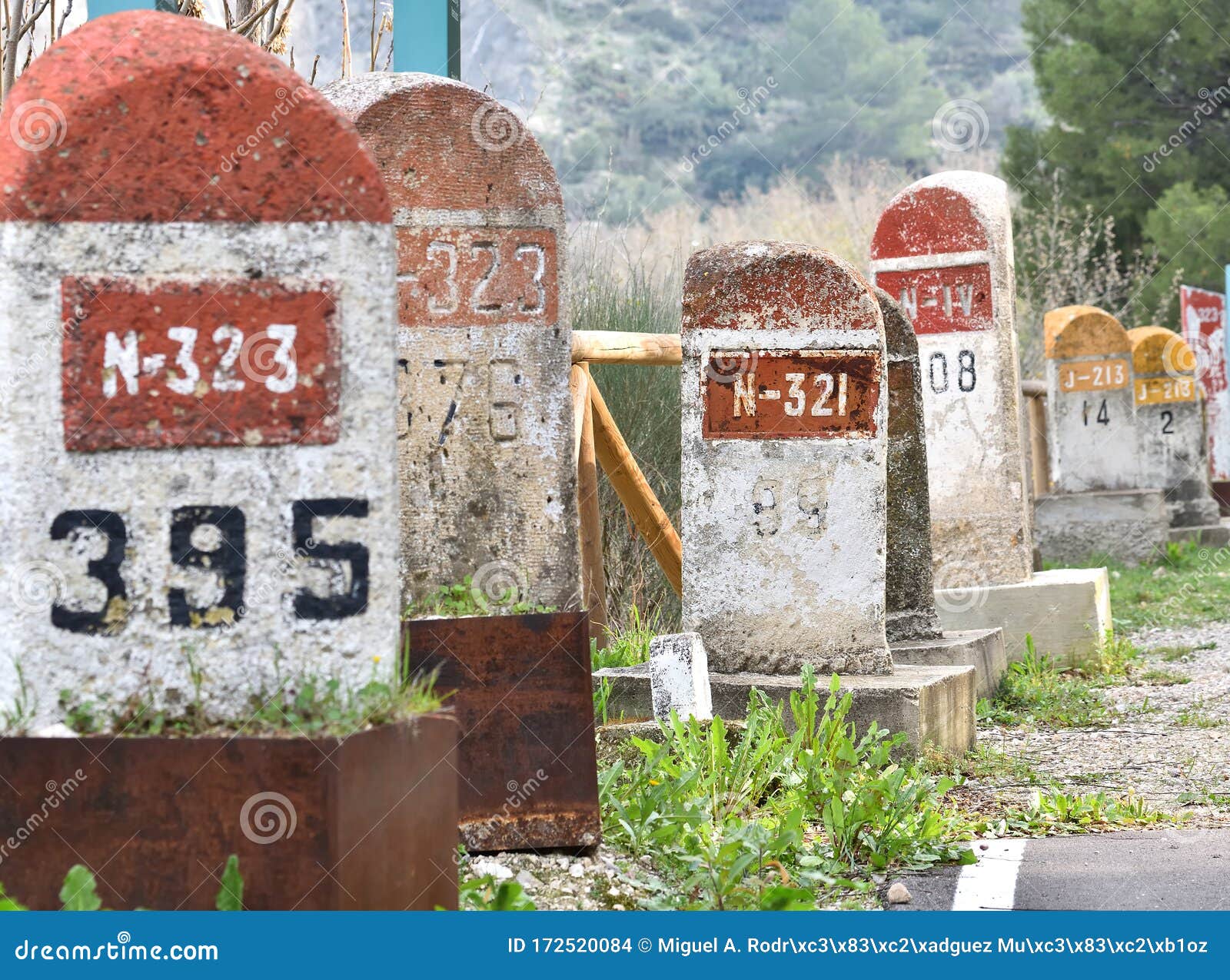 old milestones exposed on the bailen-motril road n-323 as it passes through la cerradura de pegalajar