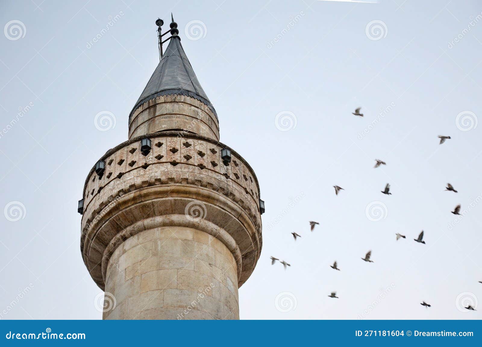 old minaret and flying pigeons, antakya, hatay, turkey (2013)