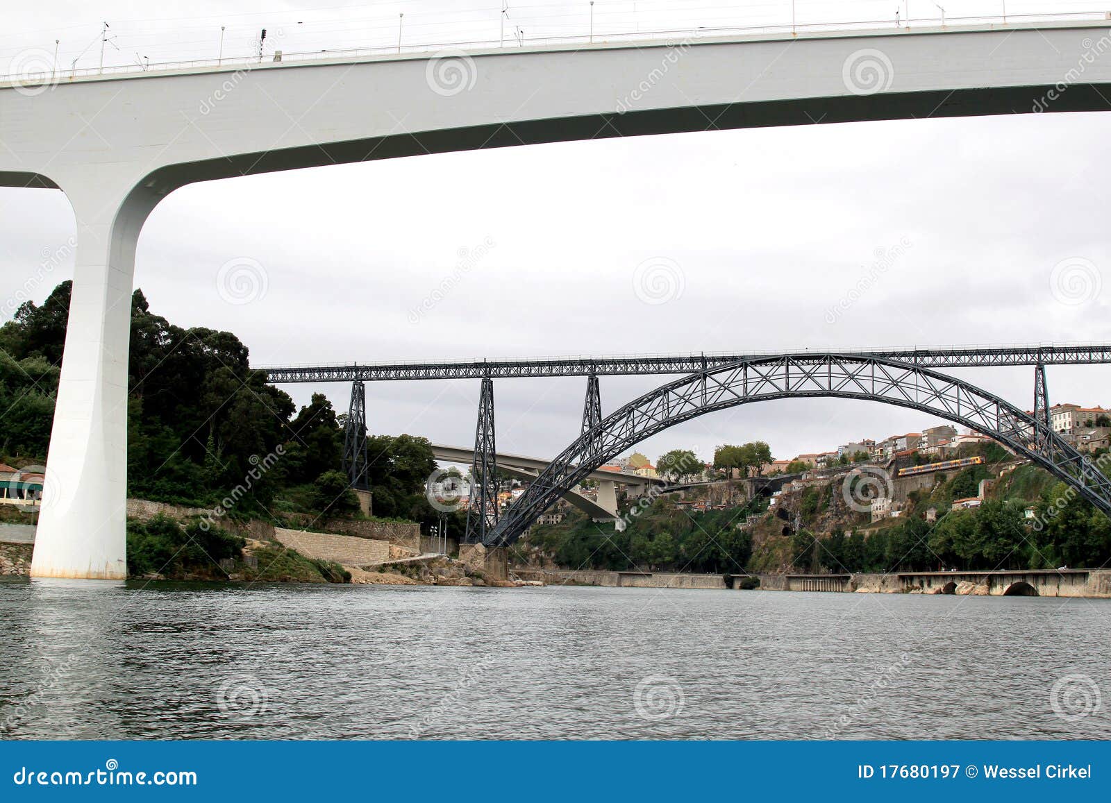 old and modern railway bridges in oporto, portugal