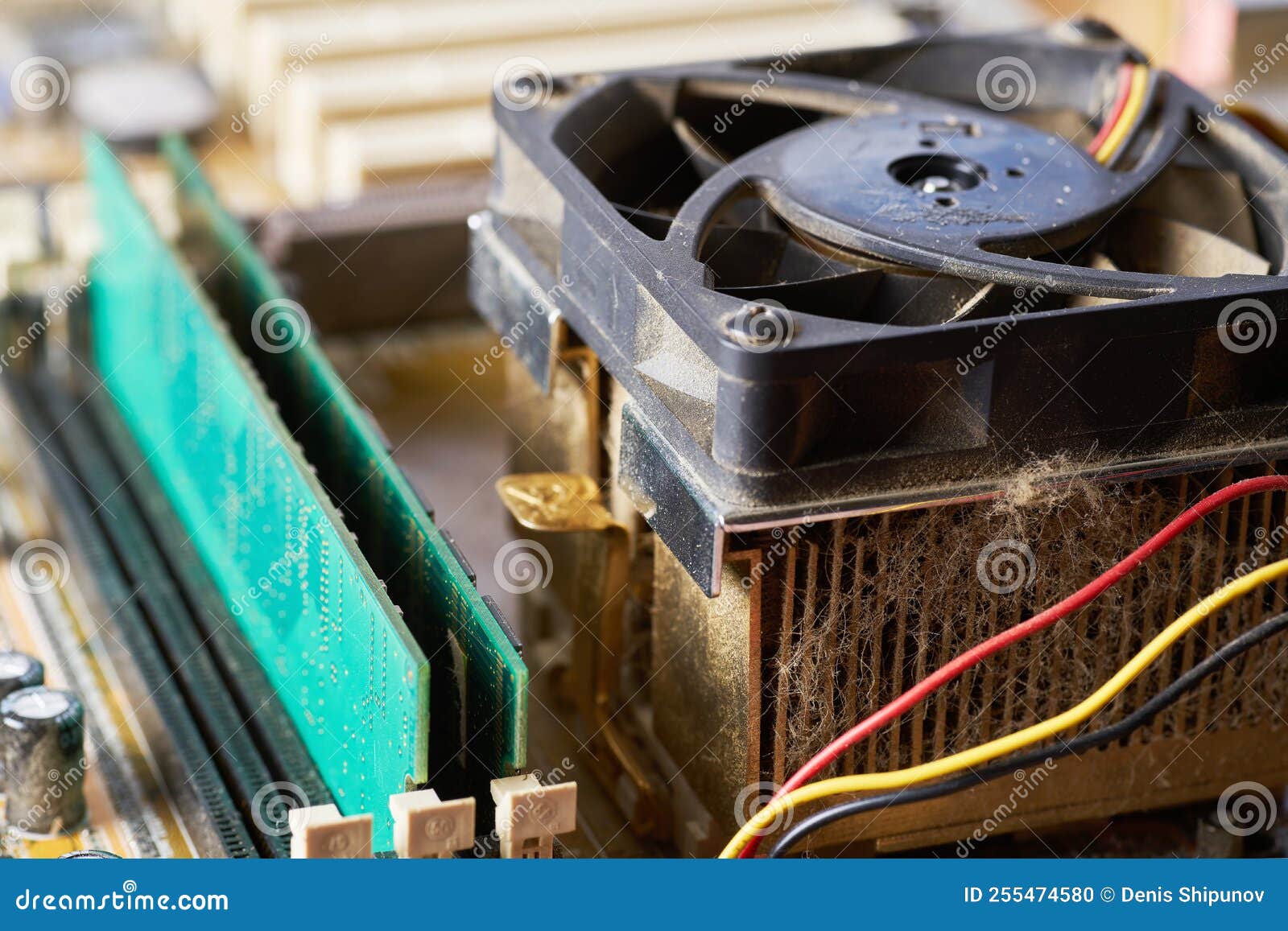 Old Motherboard Covered in Dust and Dirt. Closeup. Stock Photo Image