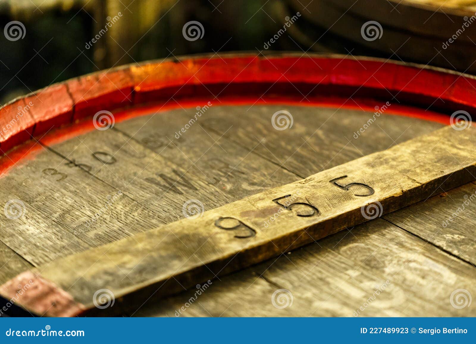 Cask For Maturing Drinks On A Brick Wall Background Stock Photo
