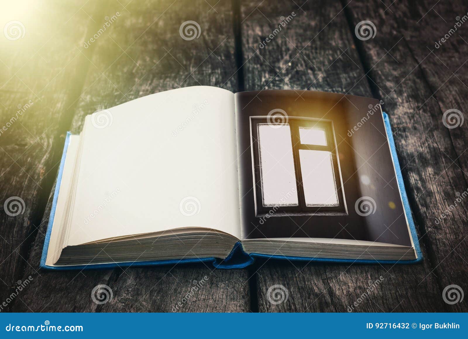 old open book on a wooden table. vintage composition. ancient library. antique literature. fabulous atmosphere.