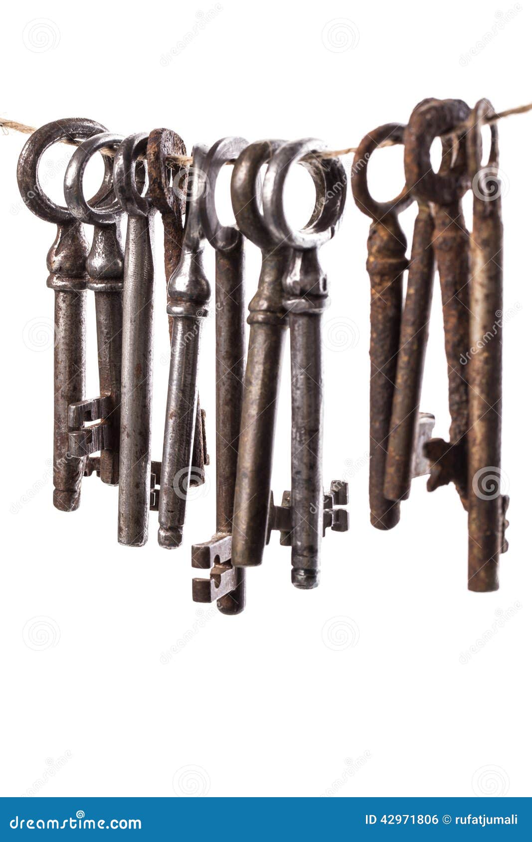 Old, ornate keys. Vintage. Old, rustic keys on a white background