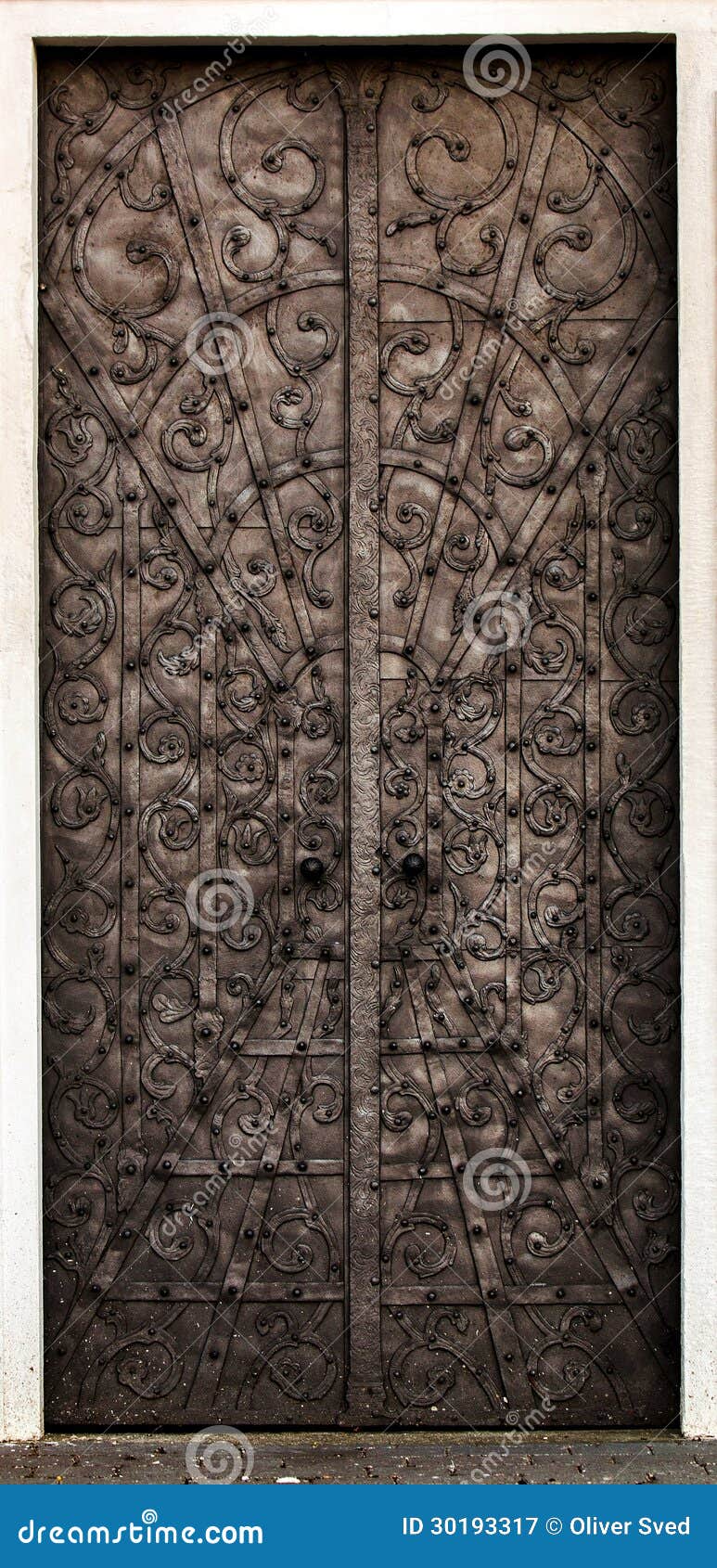 Old metal door. Old ornate metal door closeup