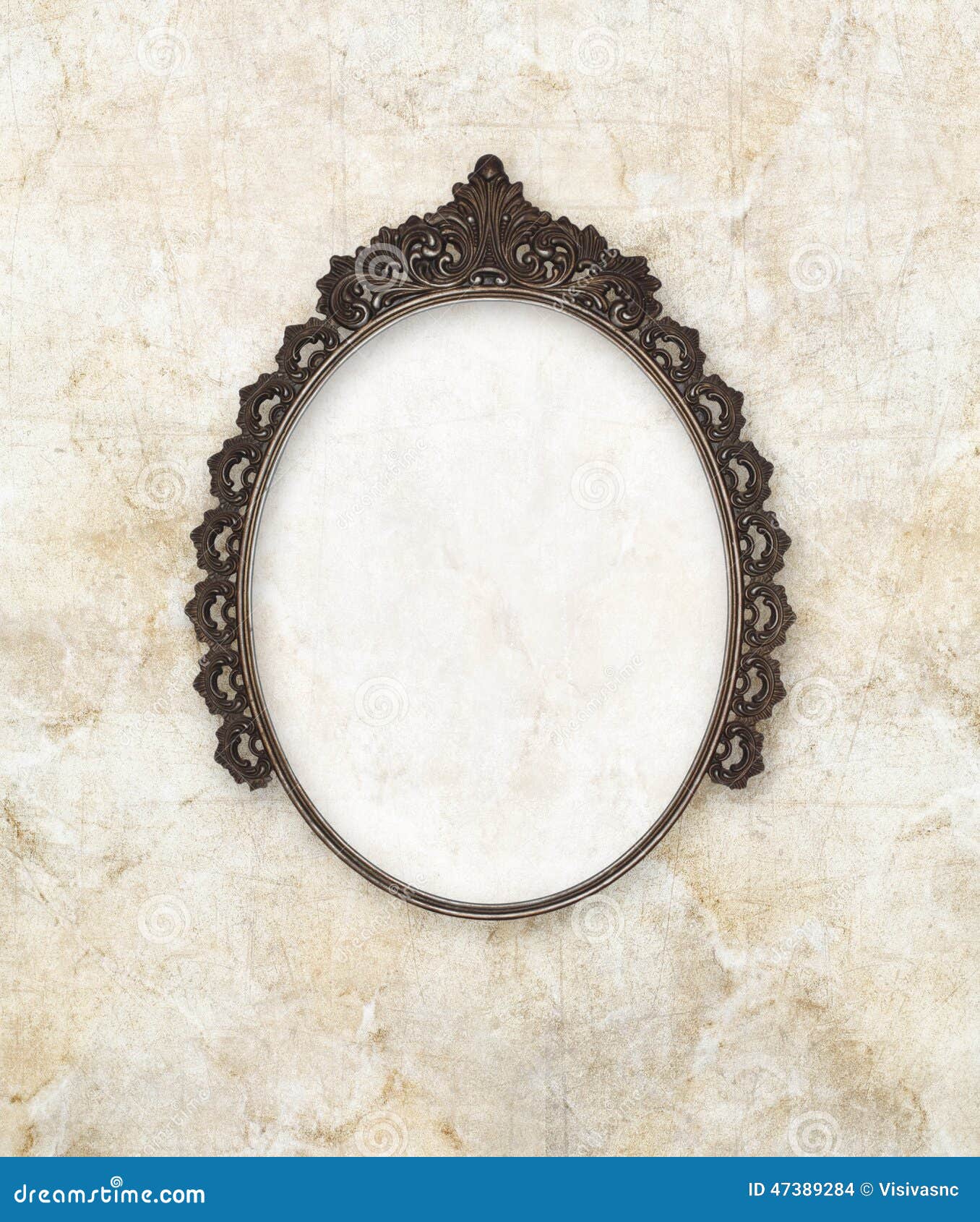 old oval picture frame metal worked on marble background