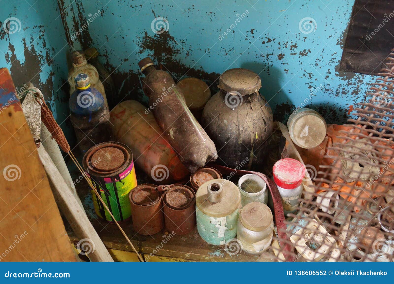 Old Paint Cans and Bottles in an Abandoned Workshop Stock Photo - Image ...