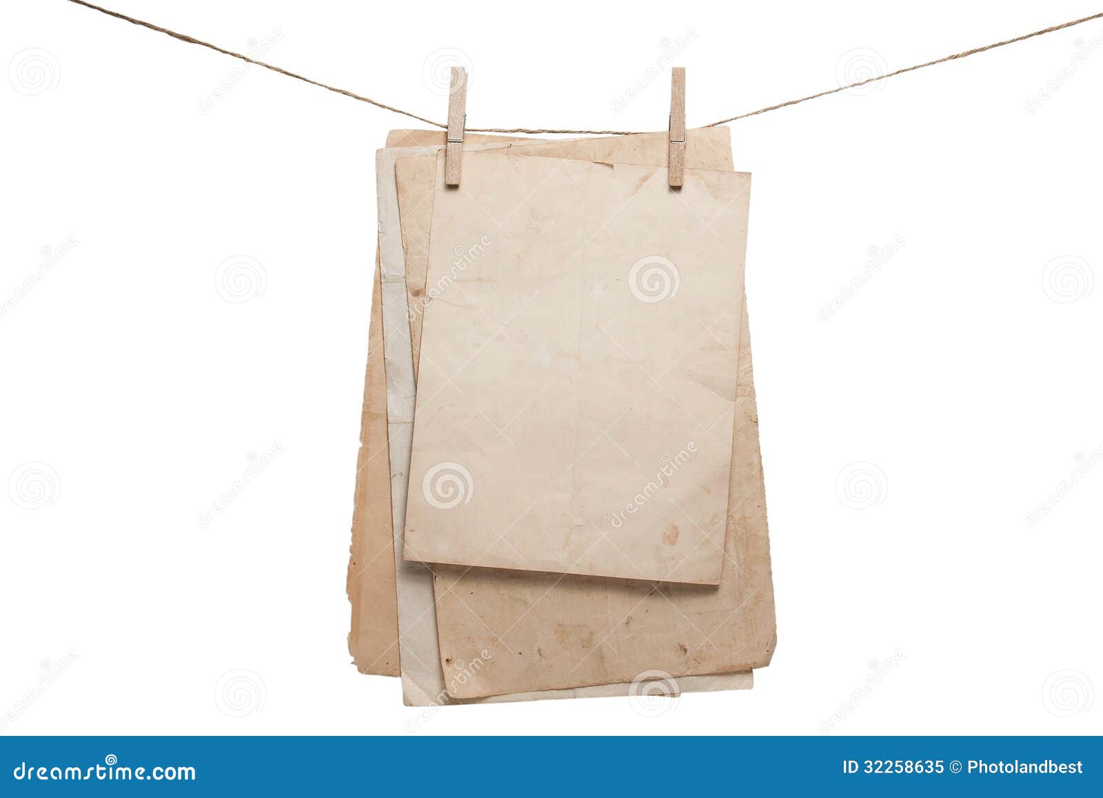 old papers hanging on the rope with clothespins