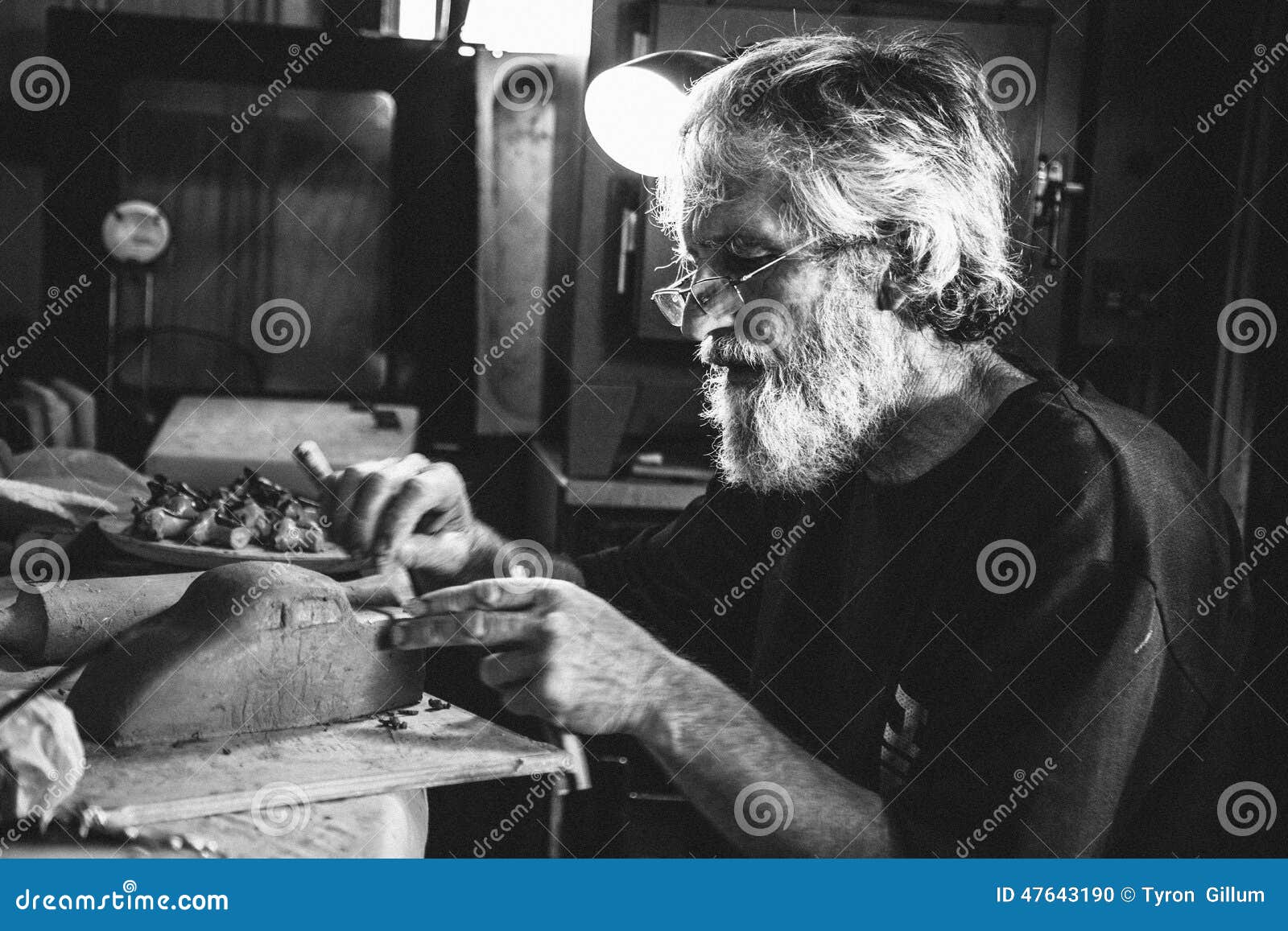 Old Pensive Man Seating In Shed Making Clay Pottery Stock ...