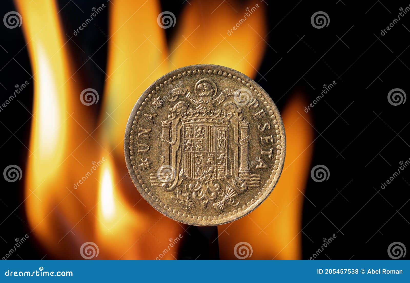 old peseta coin with the coat of arms of franco`s spain