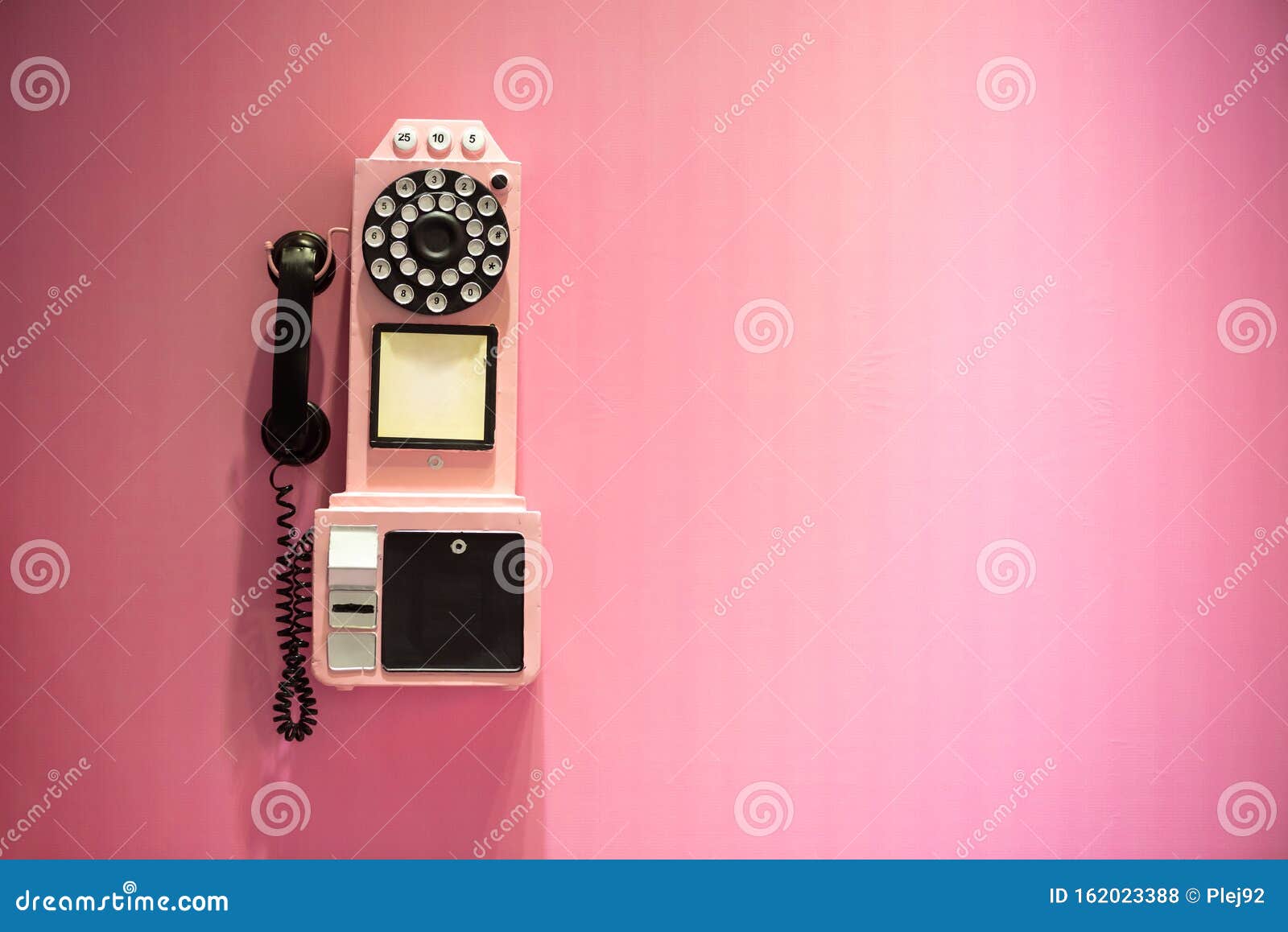 Old Phone Hanging on a Pink Wall Stock Photo Image of city, handset