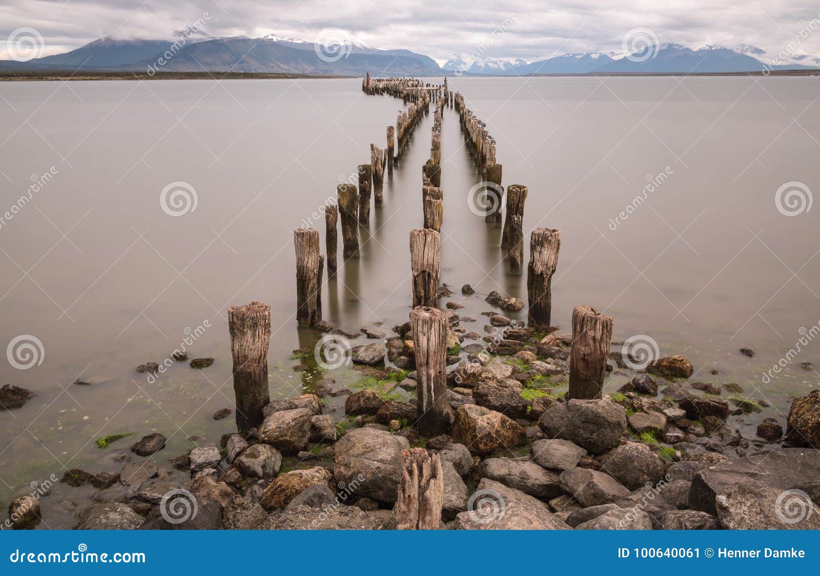 old pier at ultima esperanza sound in puerto natales