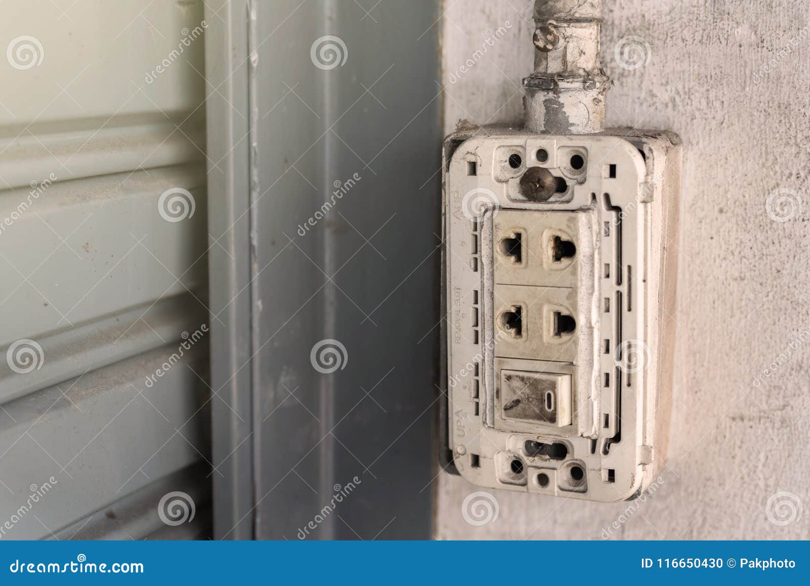 Old power plug on the wall stock photo. Image of broken 116650430