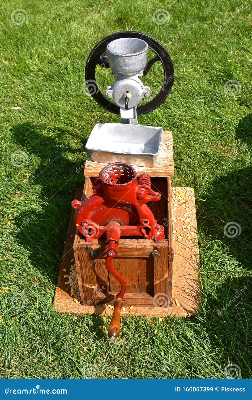 a old styled hand cranked corn sheller