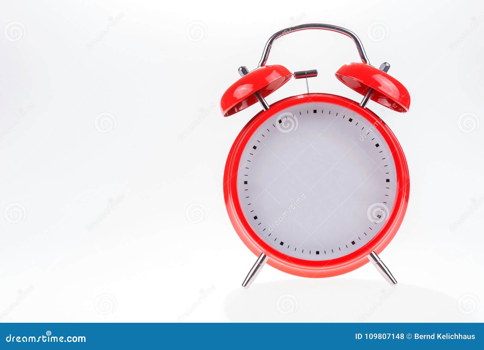 Old Red Retro Alarm Clock Without Numbers Isolated On White Stock Photo