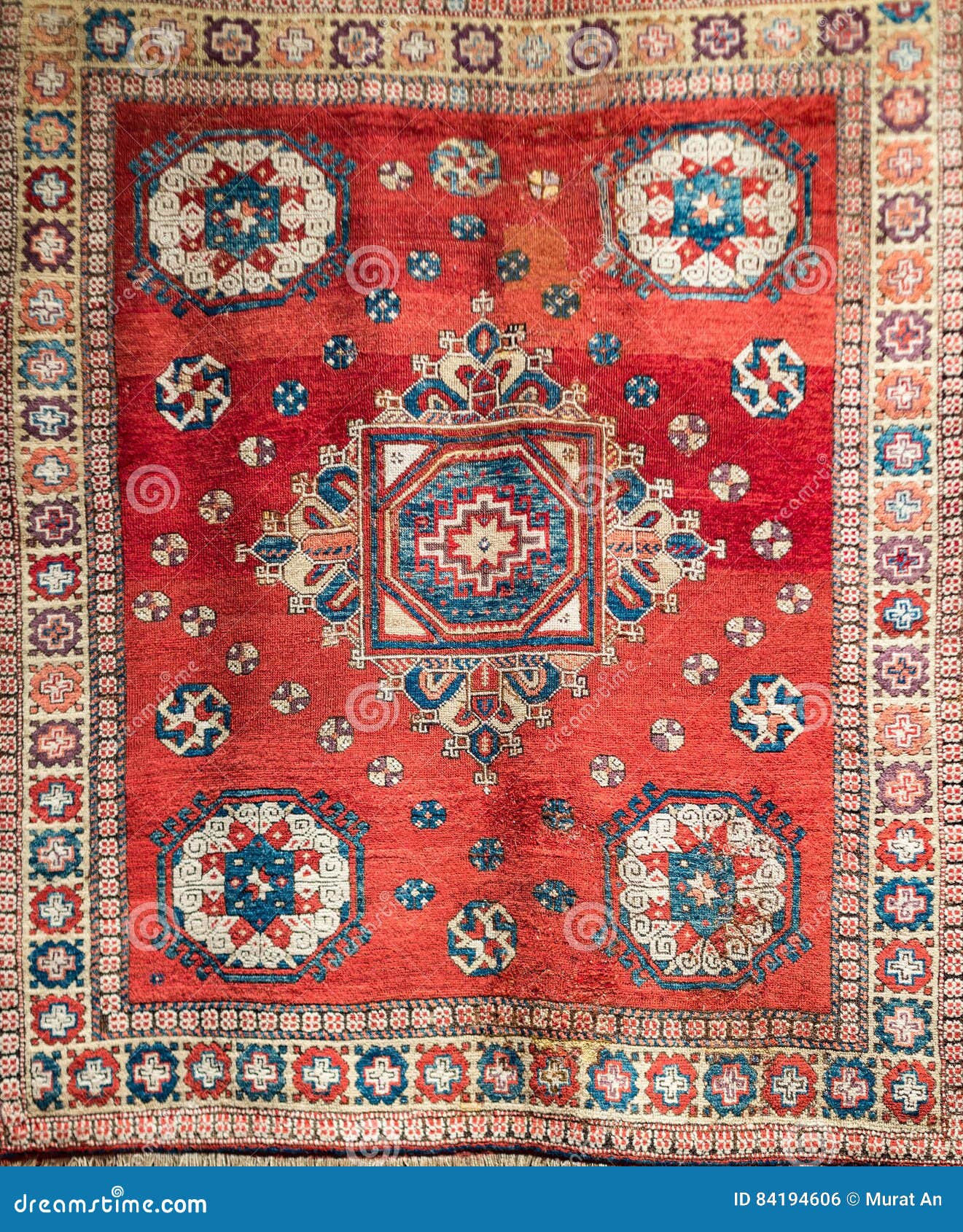 Old Red Turkish Carpet with Traditional Motif. Stock Photo Image of