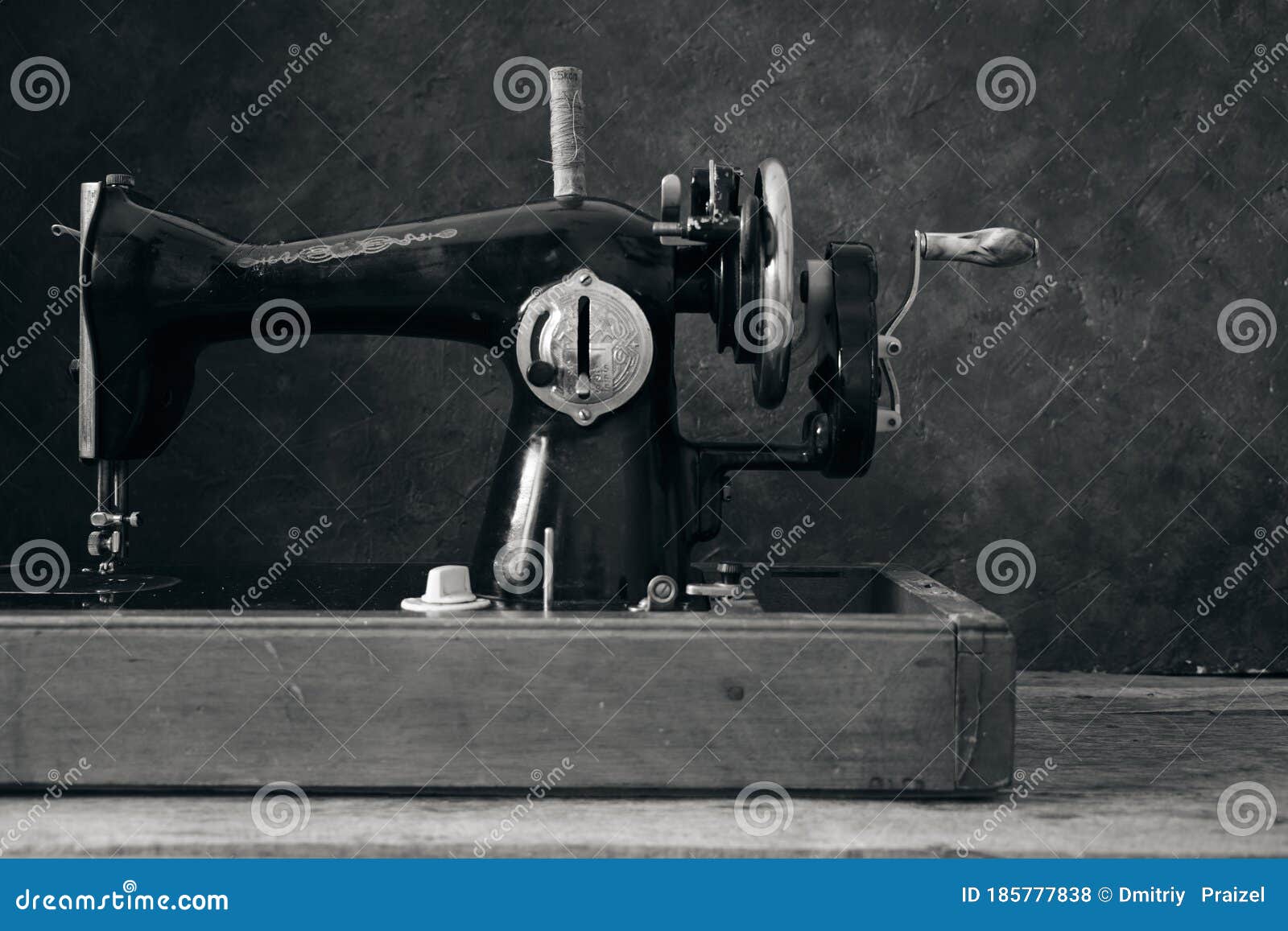 Old, Retro, Vintage Sewing Machine on a Dark Background of an Abstract