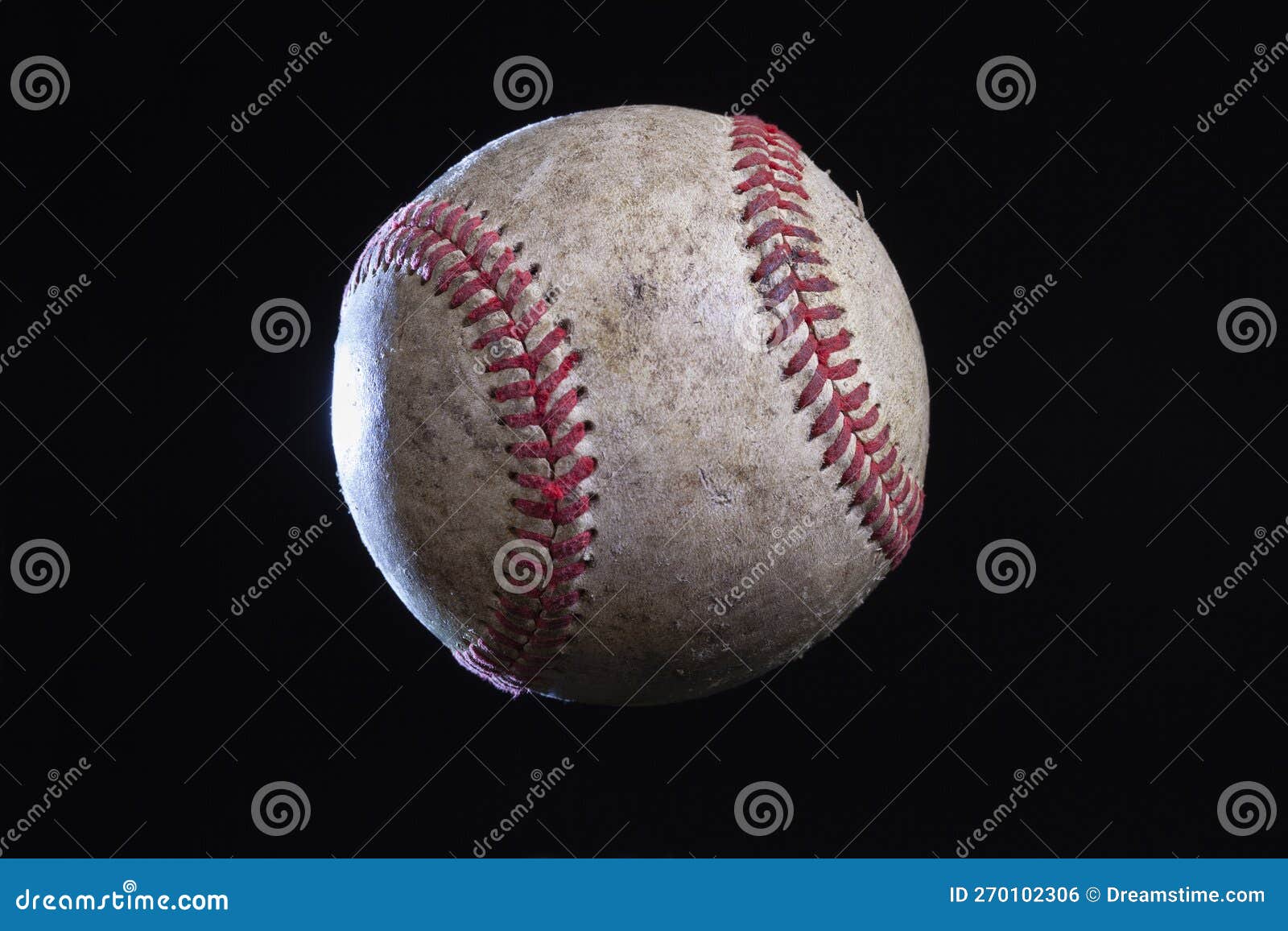 Old Rough Baseball with Dramatic Lighting Isolated on Black Background