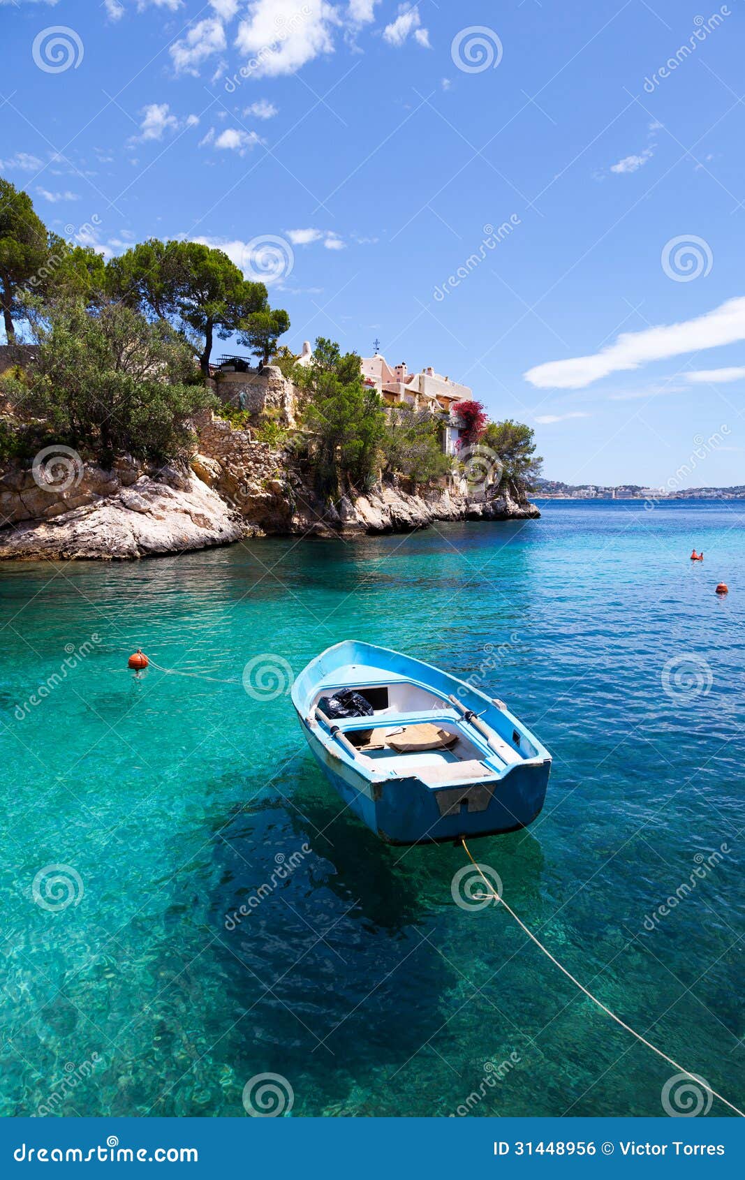 old rowboat moored in cala fornells, majorca