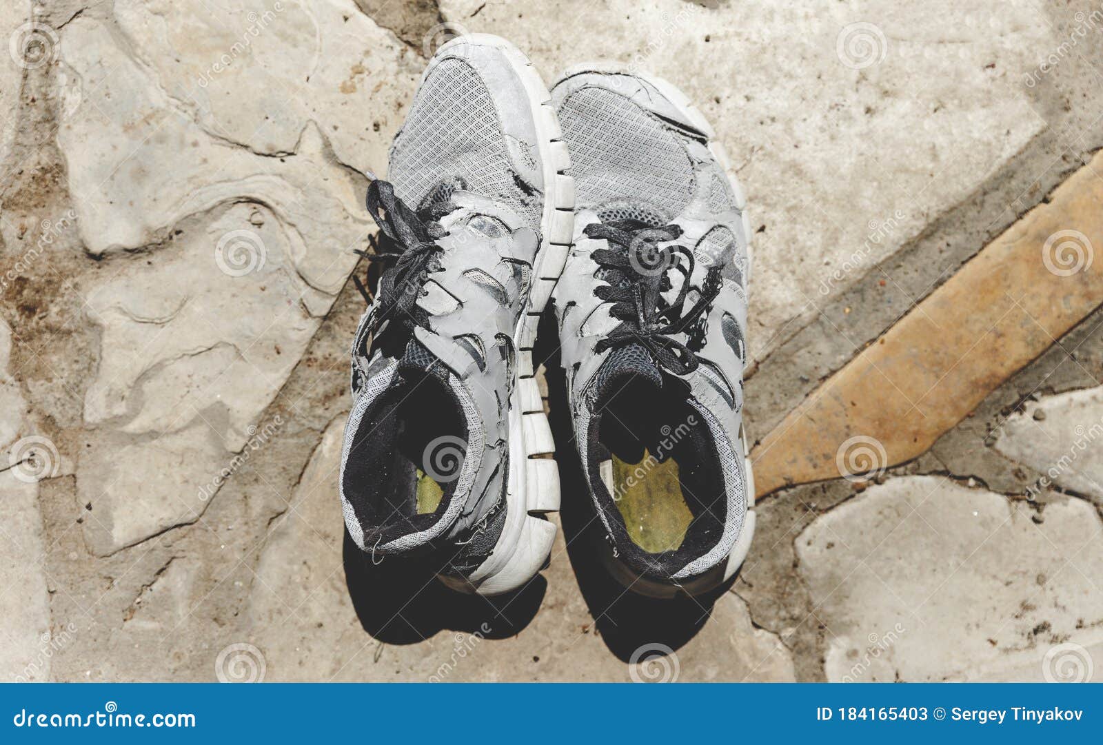 Old Running Shoes on Stone Surface Stock Image - Image of background ...