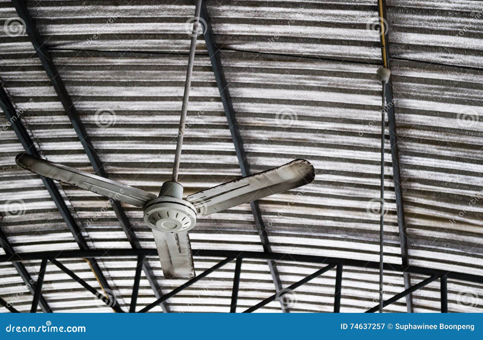 Old Rusty Ceiling Fan Hang On Warehouse Ceiling Stock Image