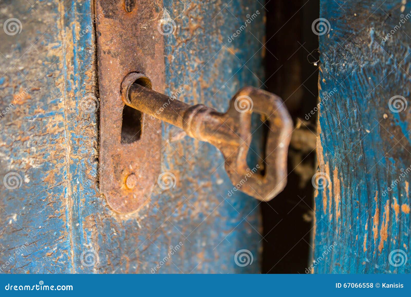 lock crack key Stock Key Blue Keyhole Old And A Wooden Door On Rusty lock crack key Stock Key Blue Keyhole Old And A Wooden Door On Rusty