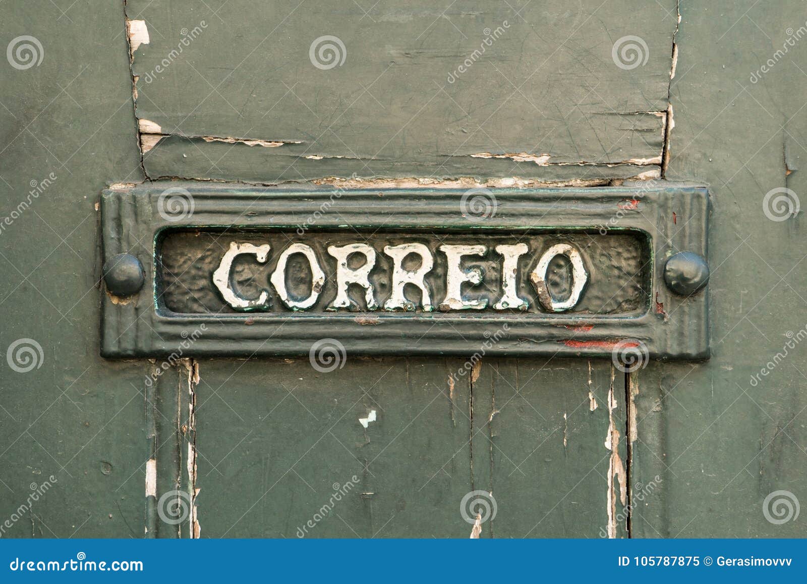 old rusty mailbox with the word correio