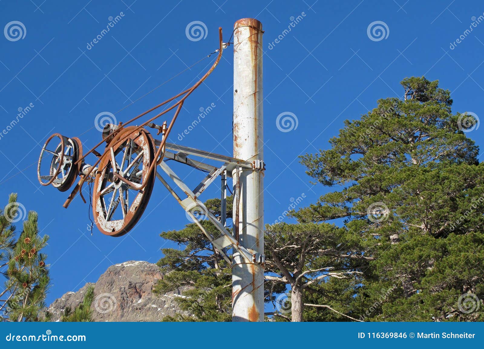 old rusty pillar of an abandoned skilift in the ese valley, corsica, france