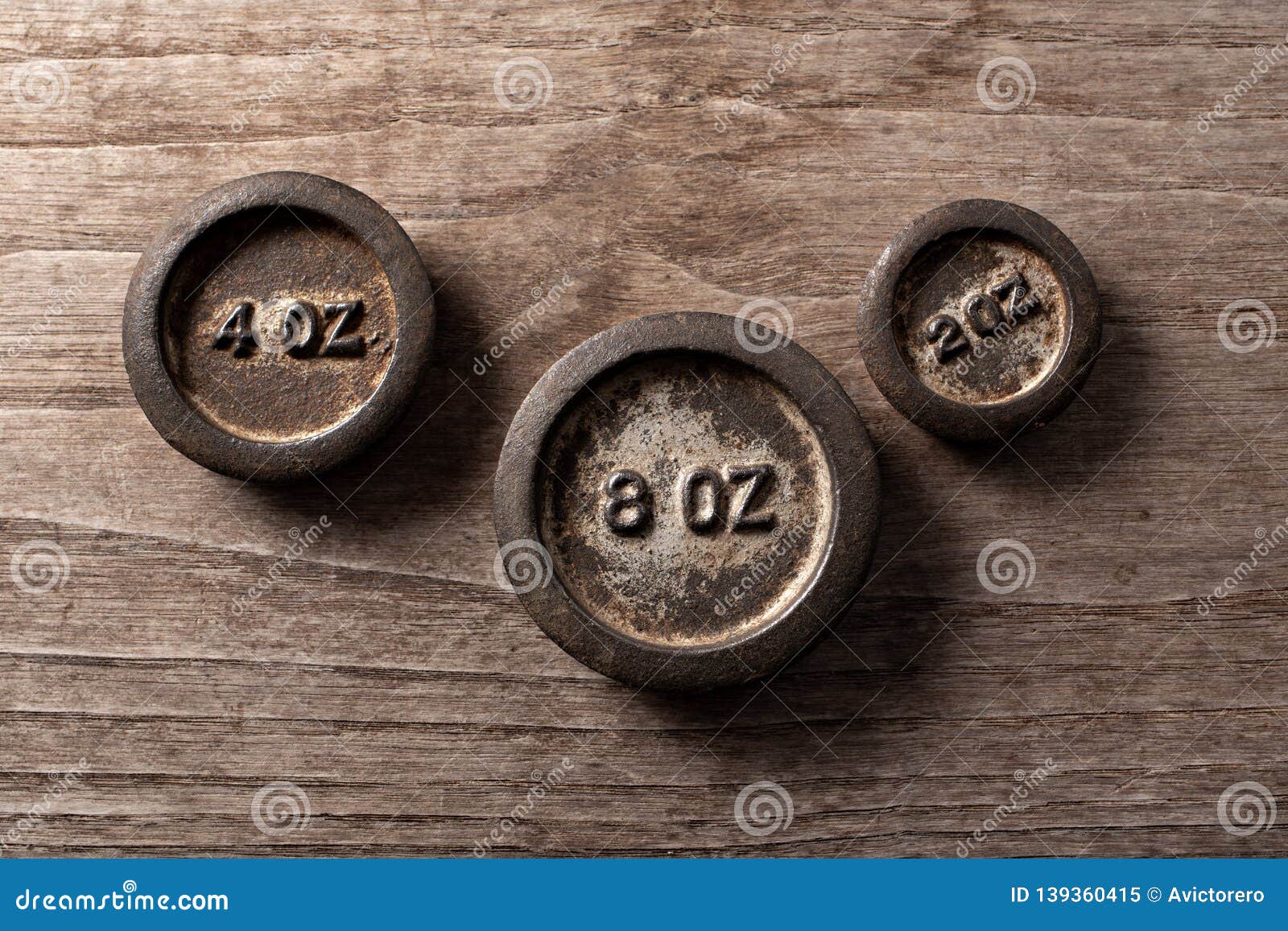 Old Rusty Scale Weight on Wooden Table Stock Image Image of charge