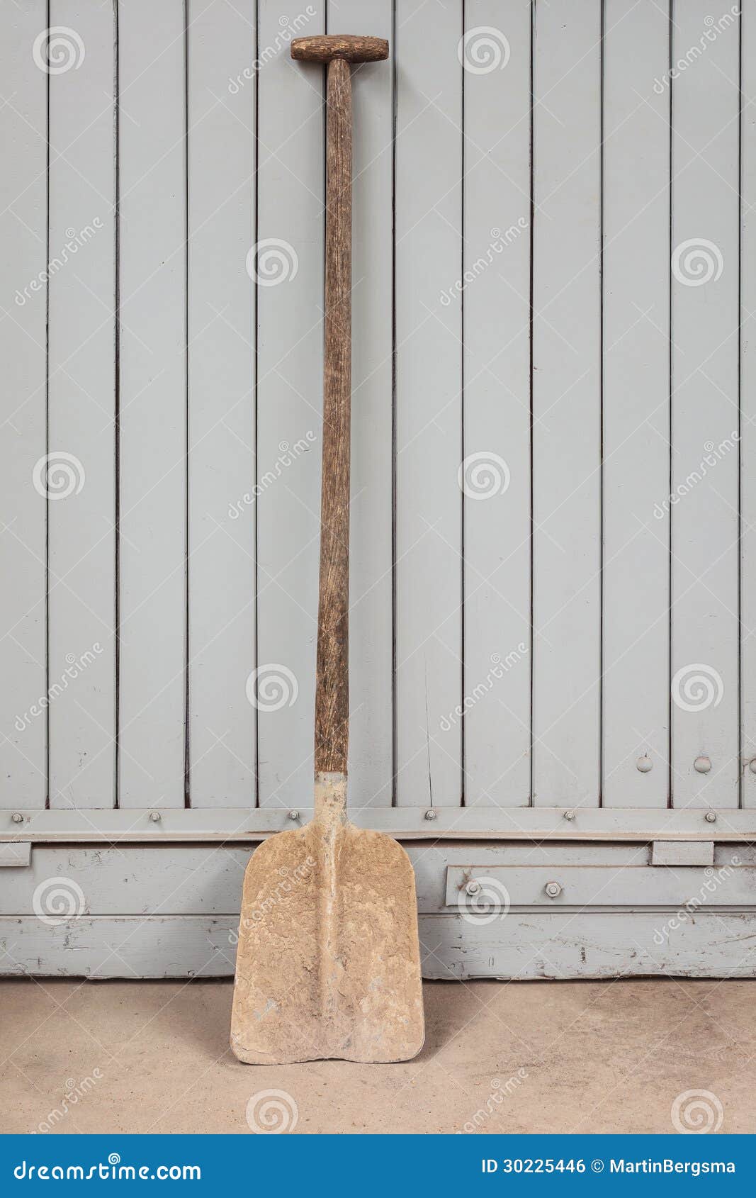 Old Rusty Shovel Against A Wooden Door Royalty Free Stock ...