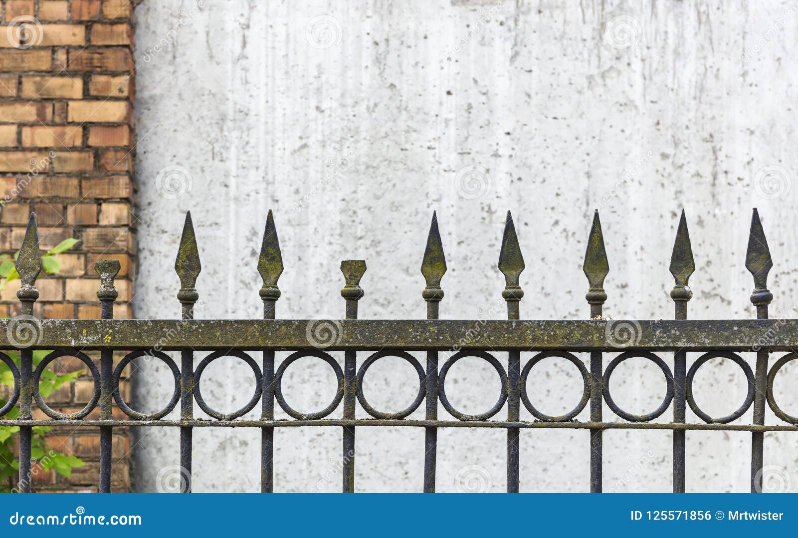 Old Rusty Spike Fence Against Wall Stock Photo - Image of fashioned ...