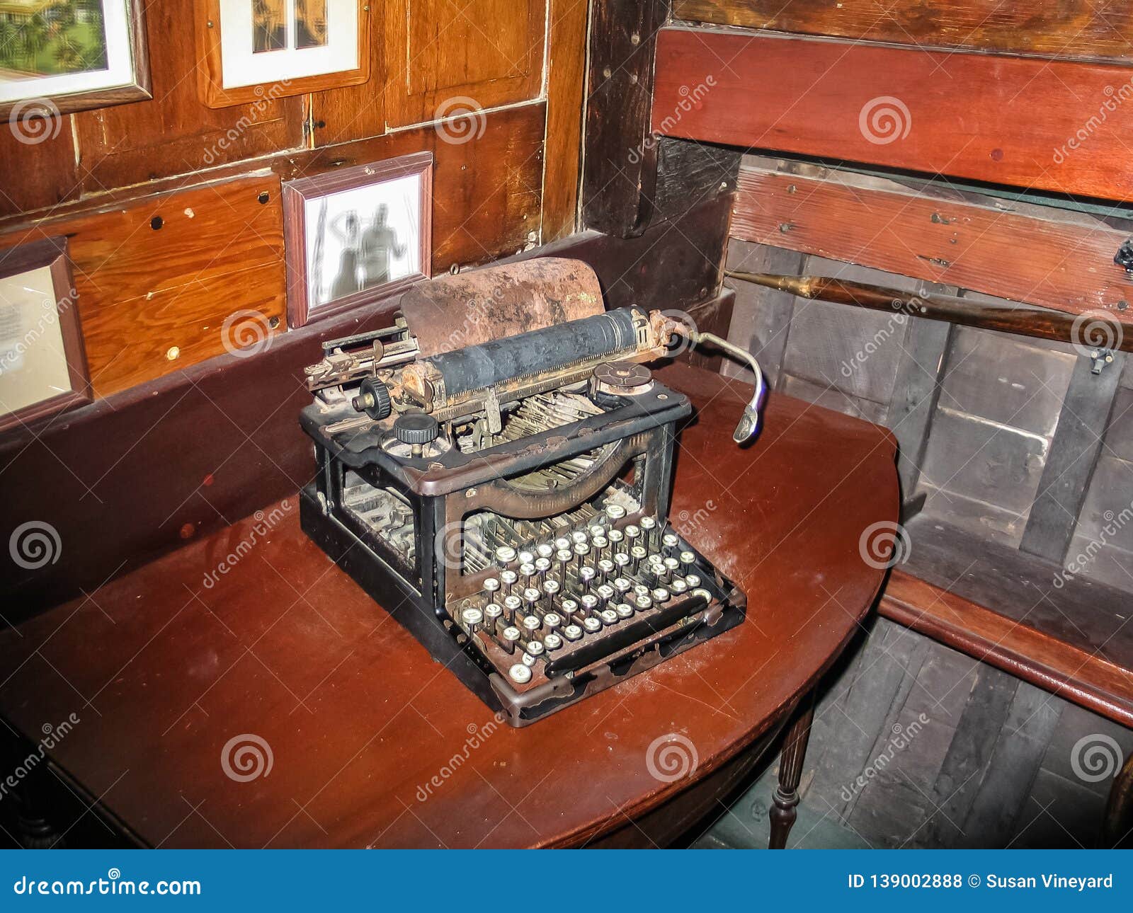Old Rusty Typewriter Sitting On Dusty Wooden Table In The Cabin Of