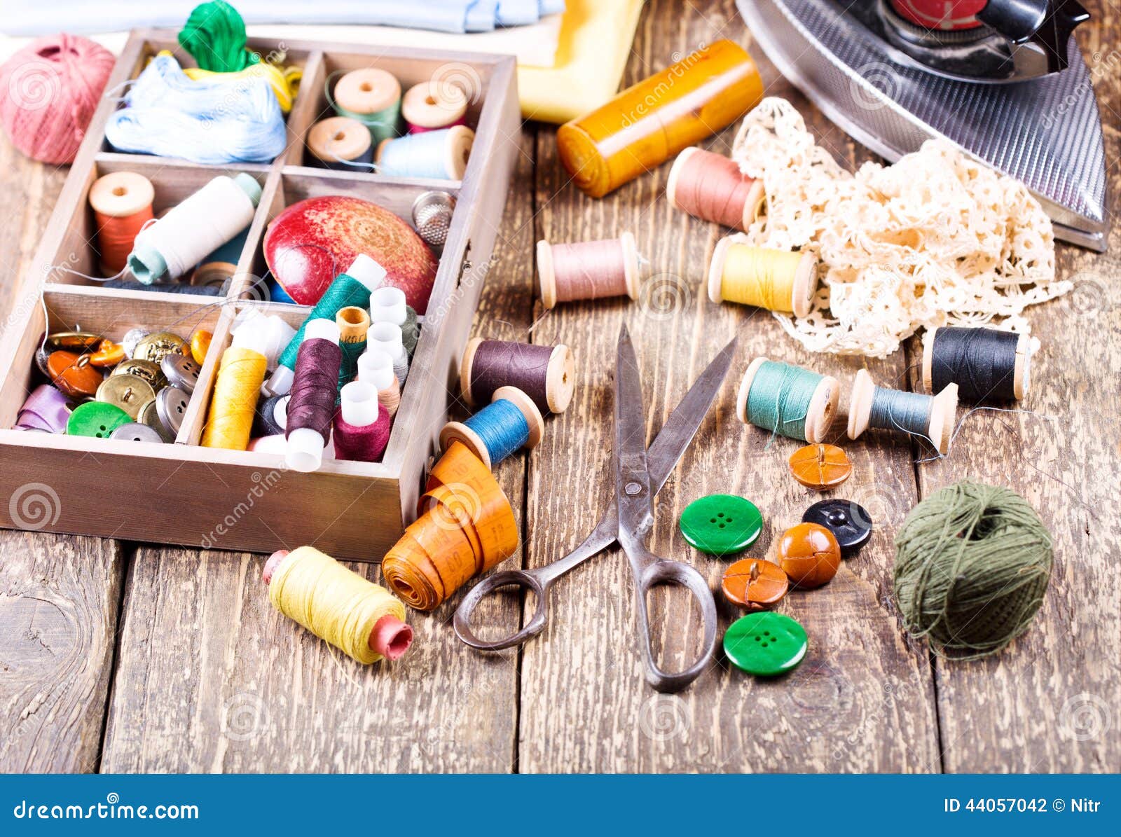 Old Scissors, Various Threads, Iron and Sewing Tools Stock Photo