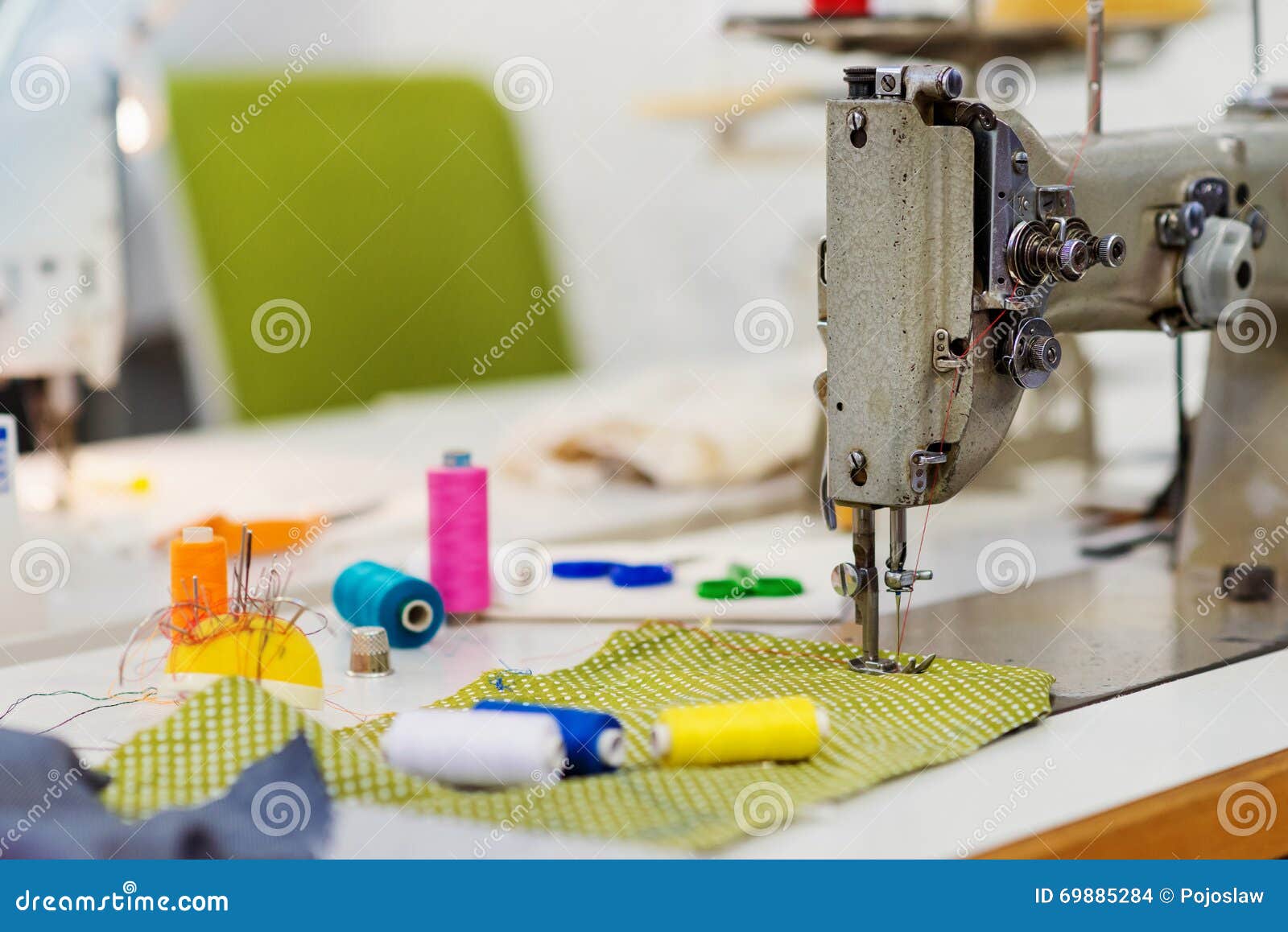 Old Sewing Machine, Threads, Pins and Piece of Fabric Stock Photo