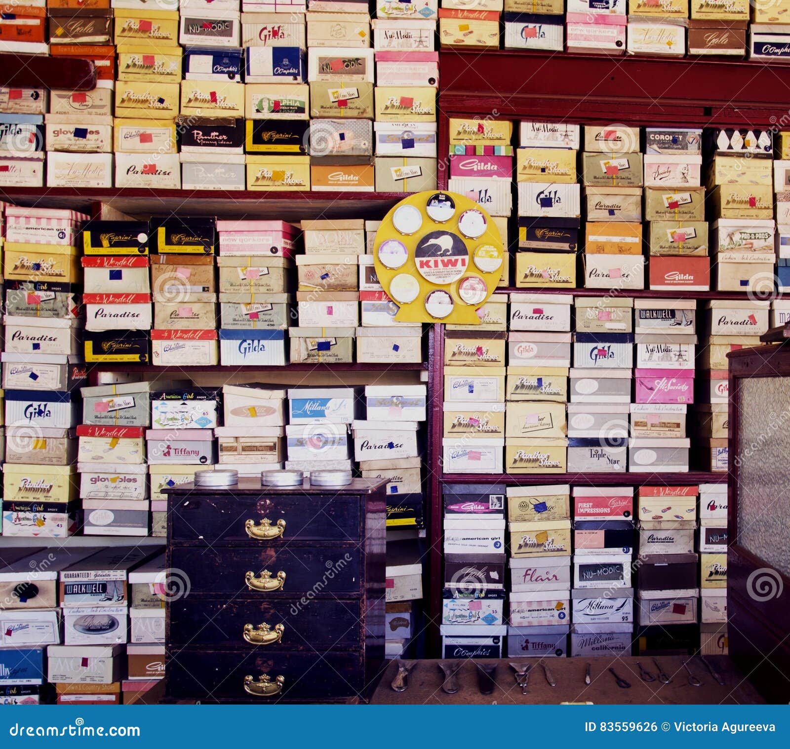Old Shoe Boxes on Store Shelves, Selective Focus Editorial Photo