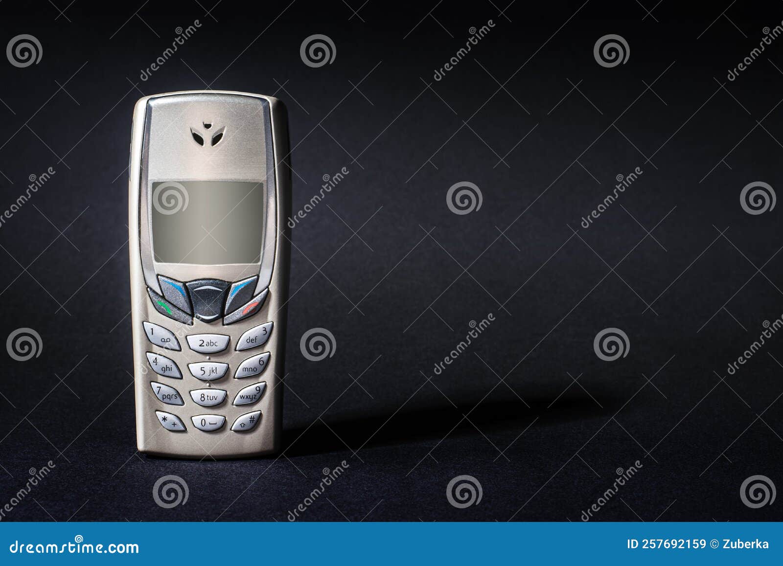Old Silver and Gold Phone with Buttons on Black Stock Image Image of