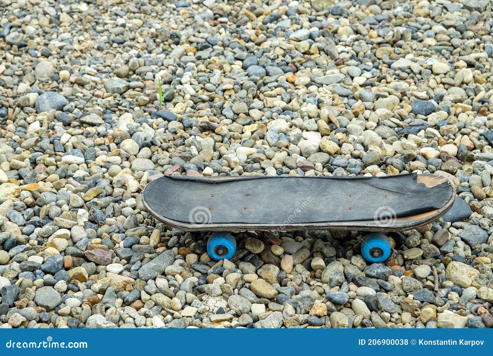 Old Skateboard Stands on Small Colored Pebbles Stock Photo Image of