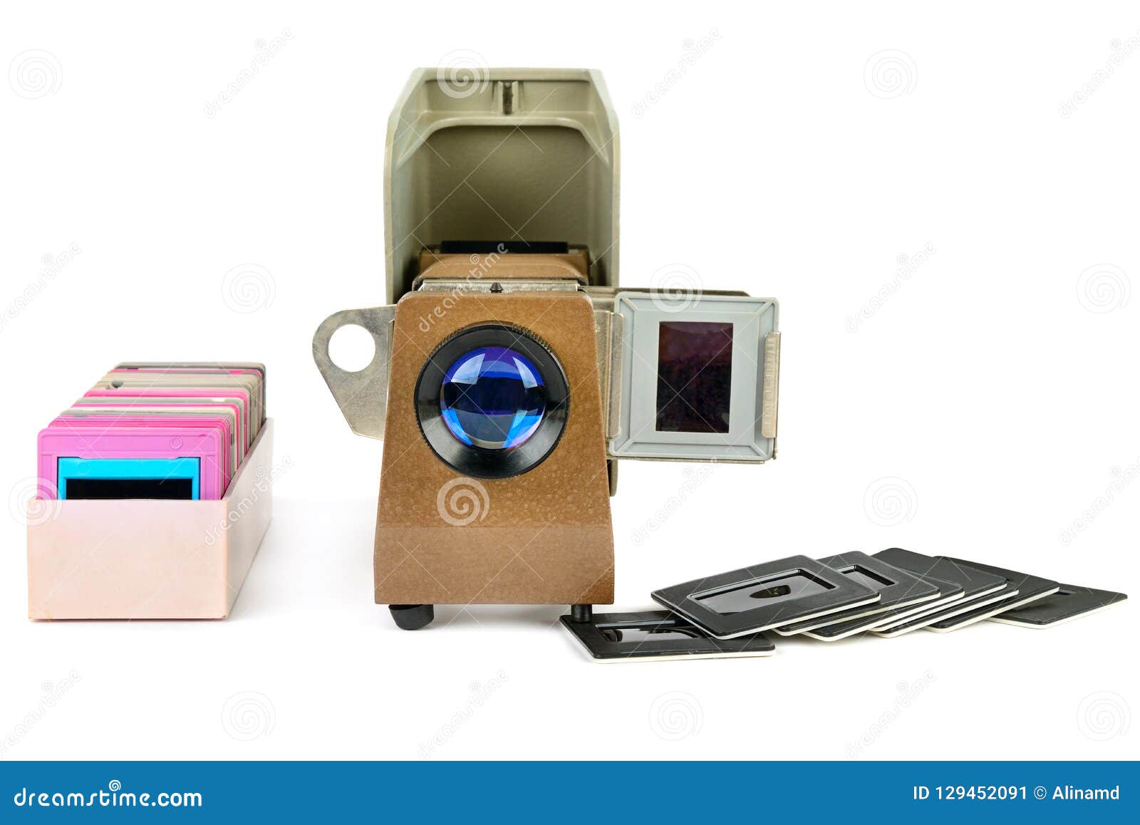 old slide projector and set of slides  on white background.