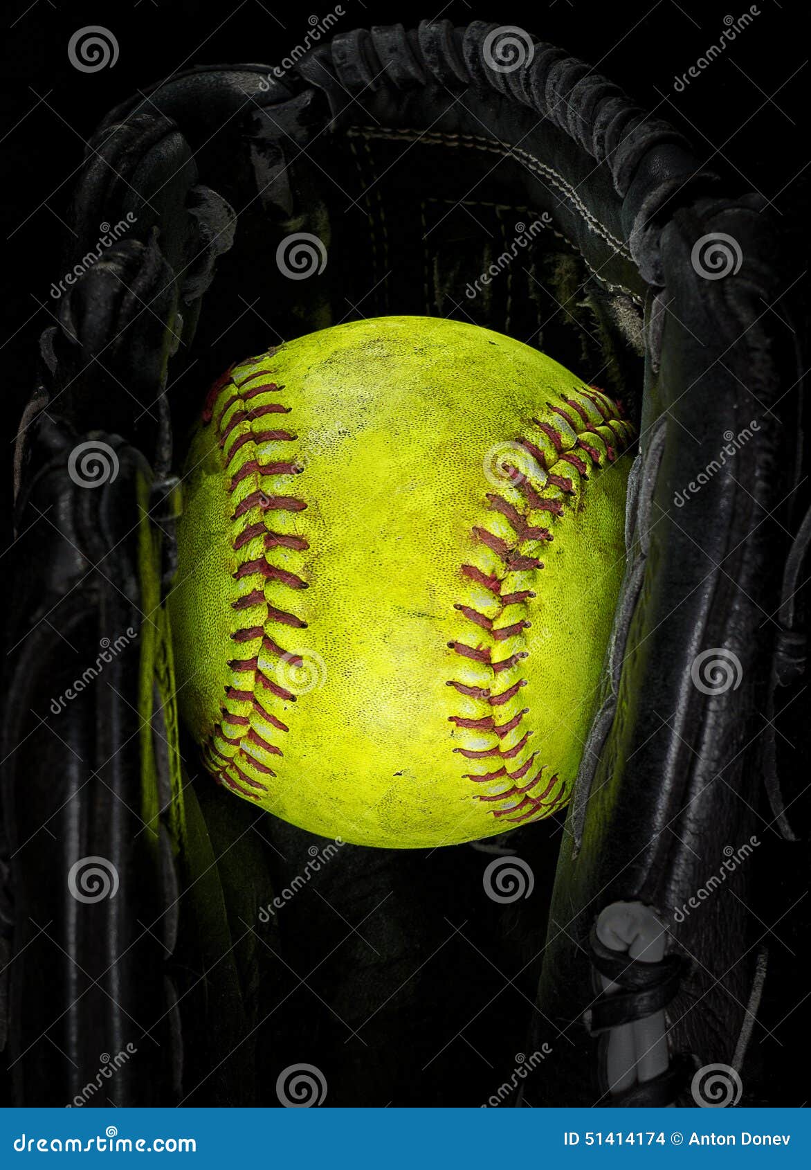 Old softball in a glove stock photo. Image of isolated 51414174