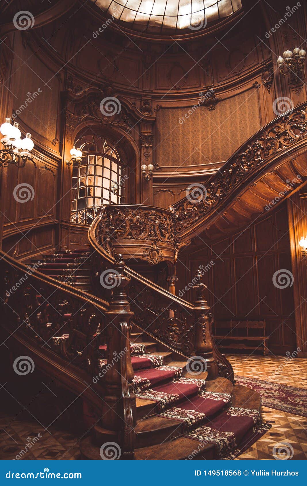 Old Spiral Wooden Staircase With Vintage Railing Indoors