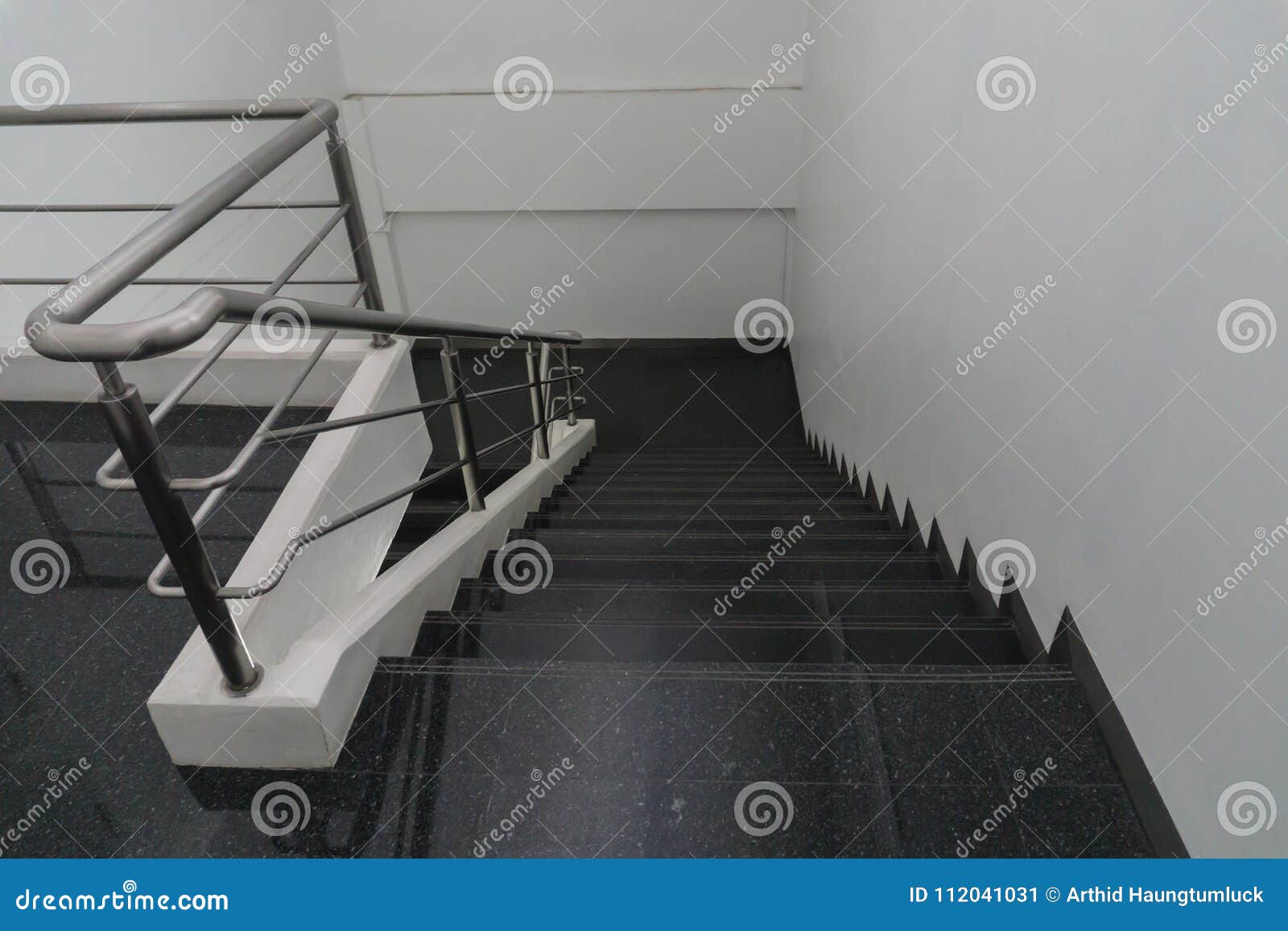 old staircase with a handrail in a building., in the office