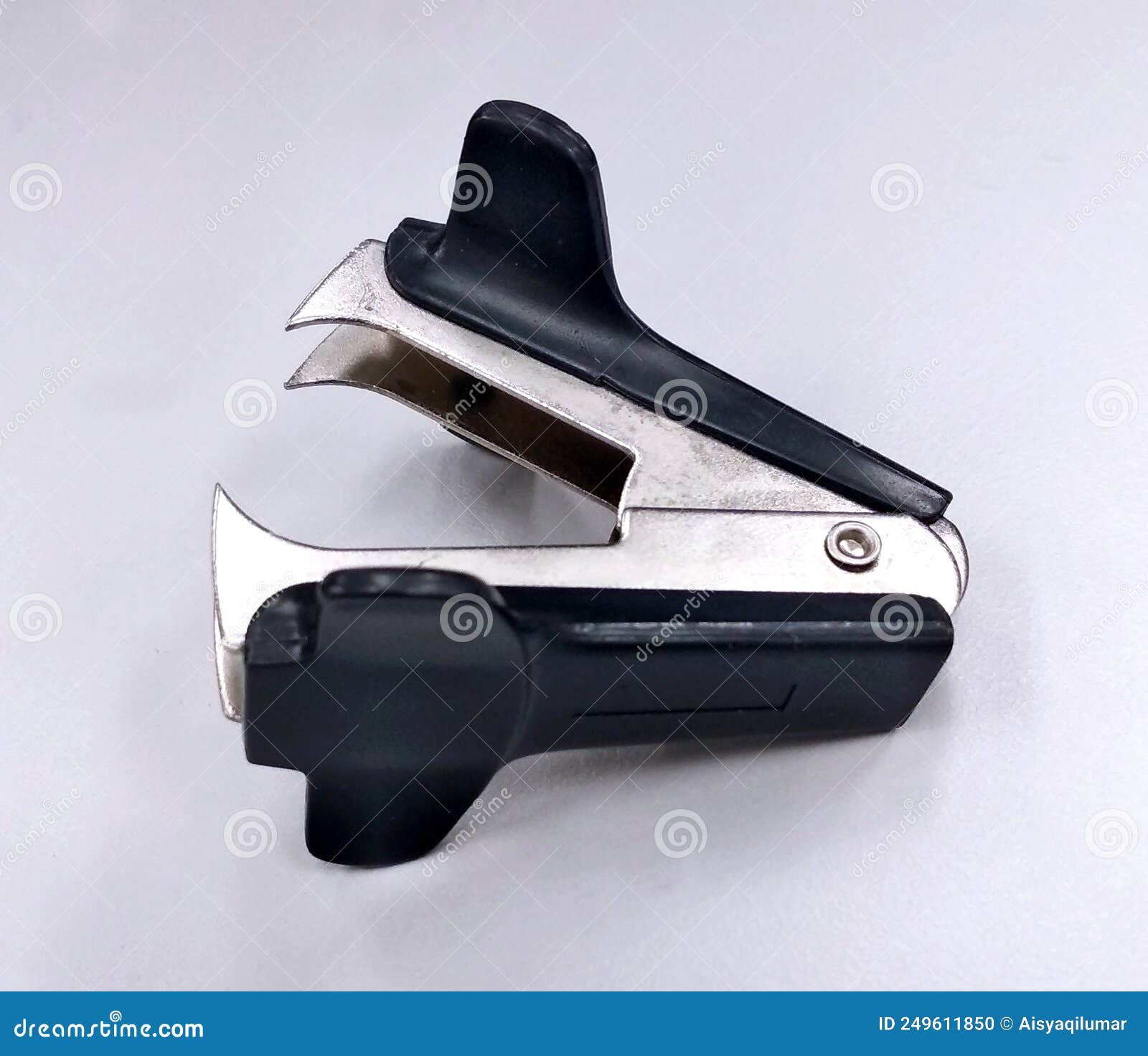 Old Staple Puller or Staple Remover Isolated on White Background. Stock  Photo - Image of binder, object: 249611850