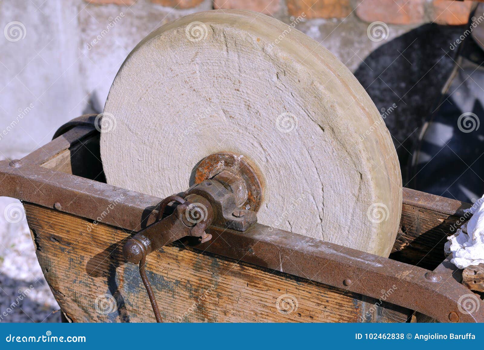 Old stone grinding wheel stock photo. Image of device 102462838