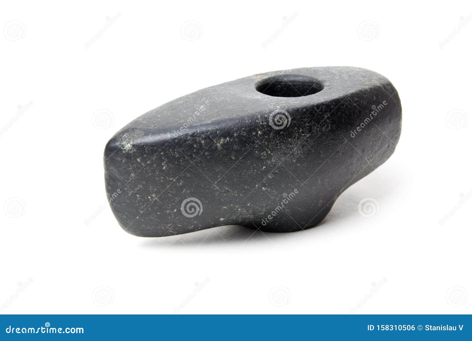 An Old Stone Hammer on White Background . Ancient Axe Female for