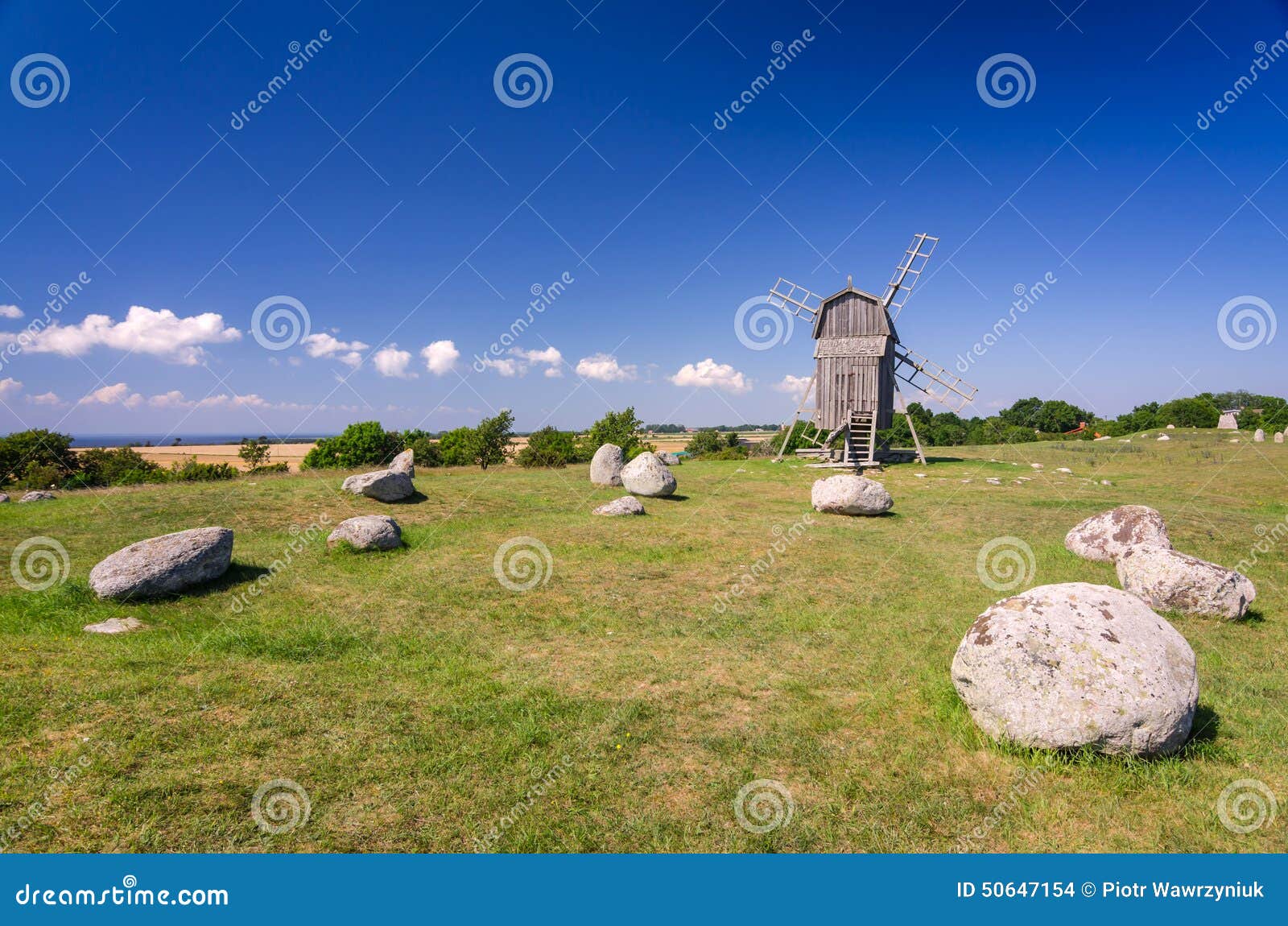 old stone henge and windmill