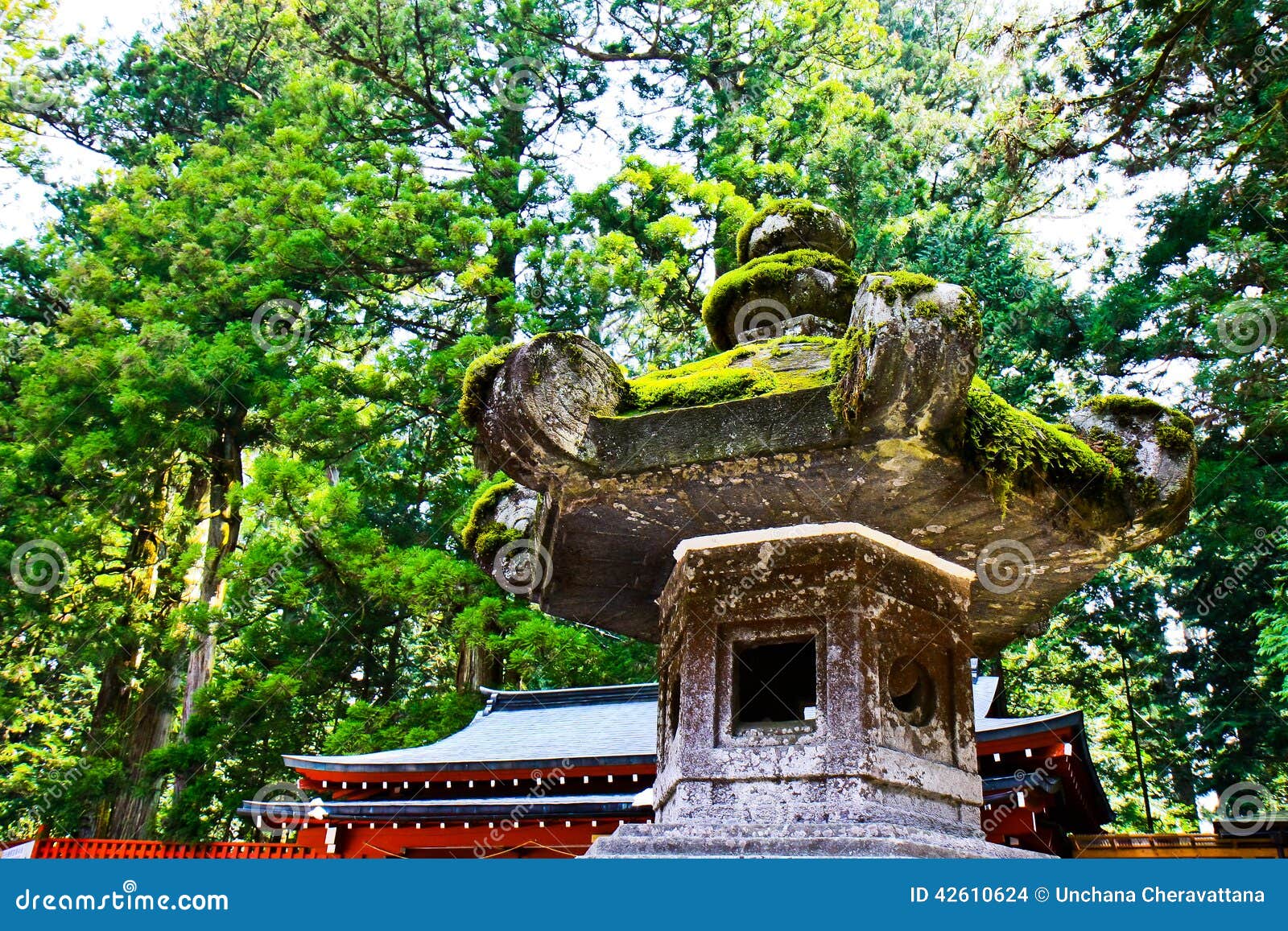 Old Stone Lantern stading in front of the shrine/temple in Nikko, Japan.