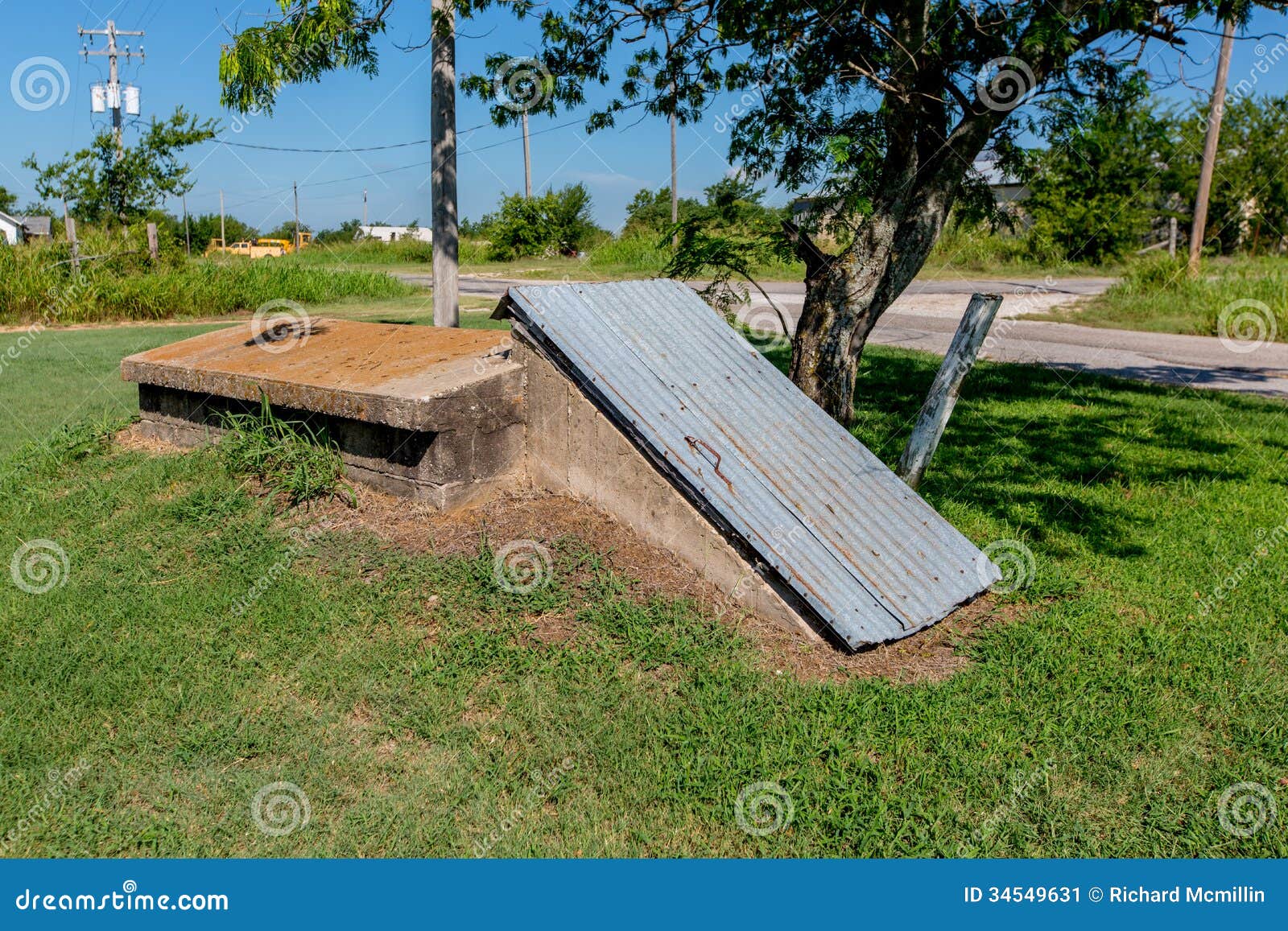 an old storm cellar or tornado shelter in rural oklahoma.