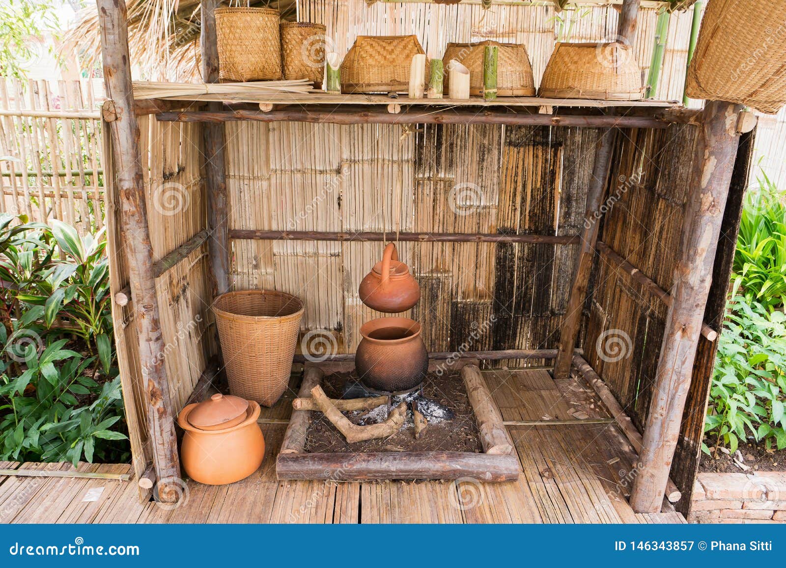 Old Style of Hill Tribe Fireplace Kitchen with Kitchenware Stock Image